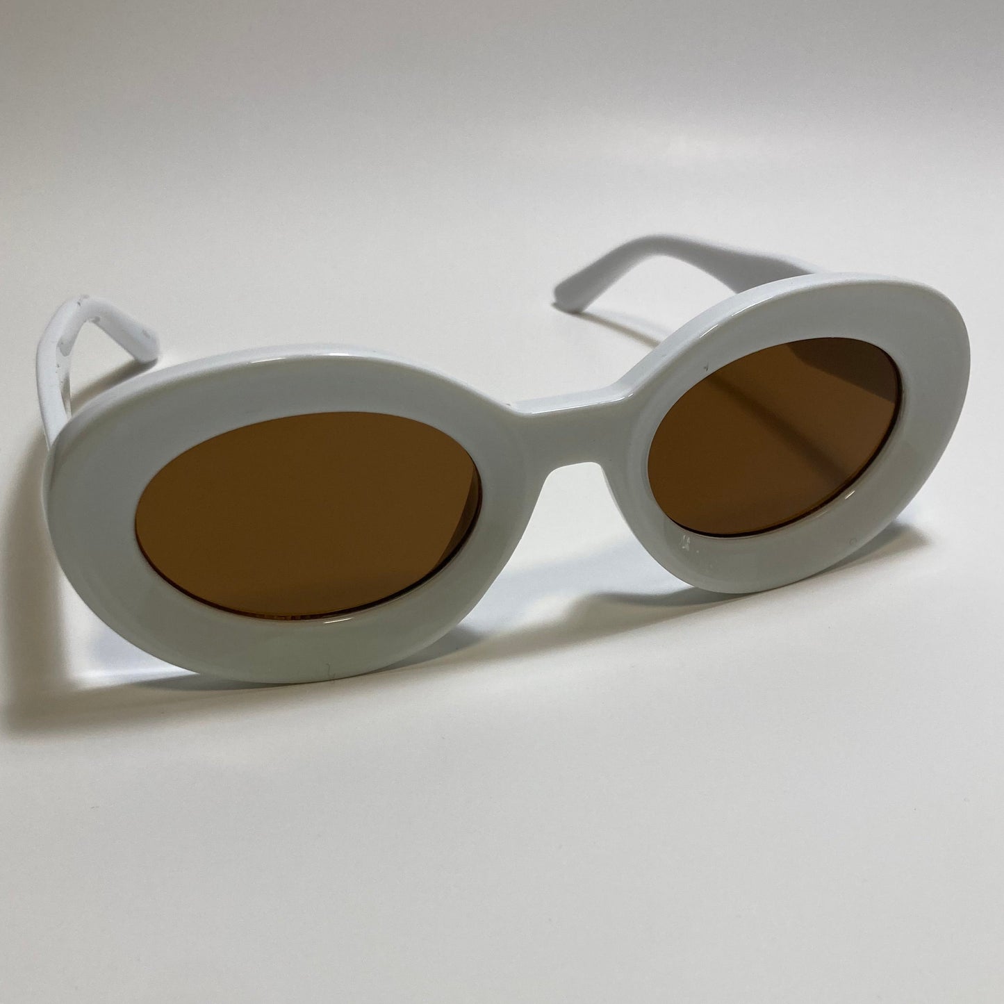 white frame brown lens round womens MCM sunglasses with chunky frame