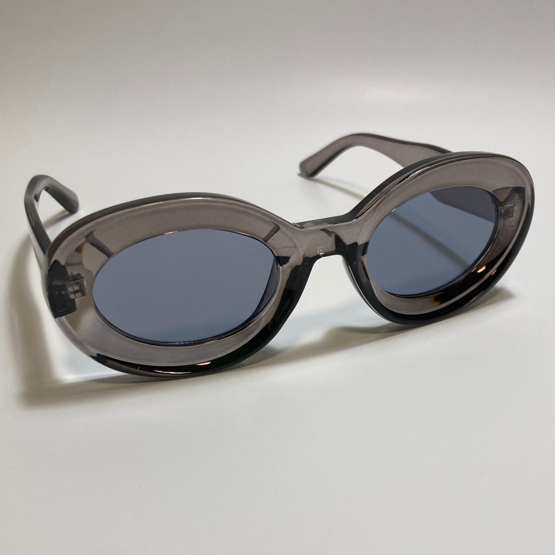 clear gray round womens MCM sunglasses with chunky frame