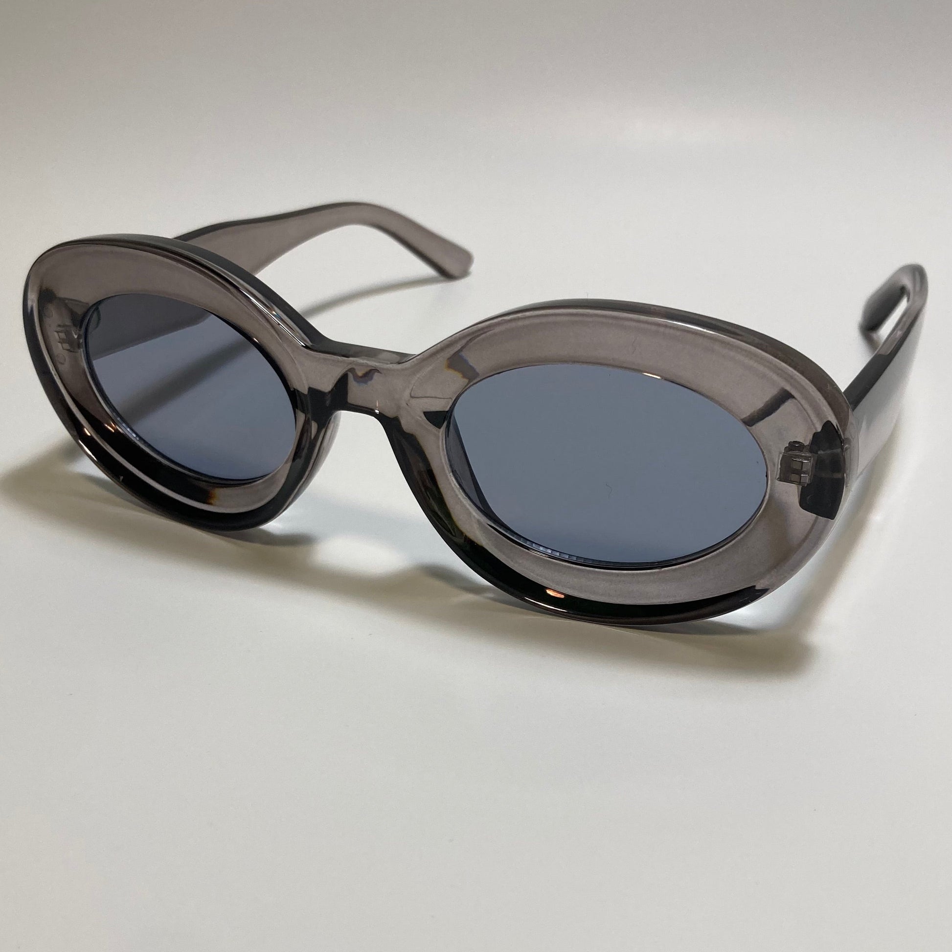clear gray round womens MCM sunglasses with chunky frame