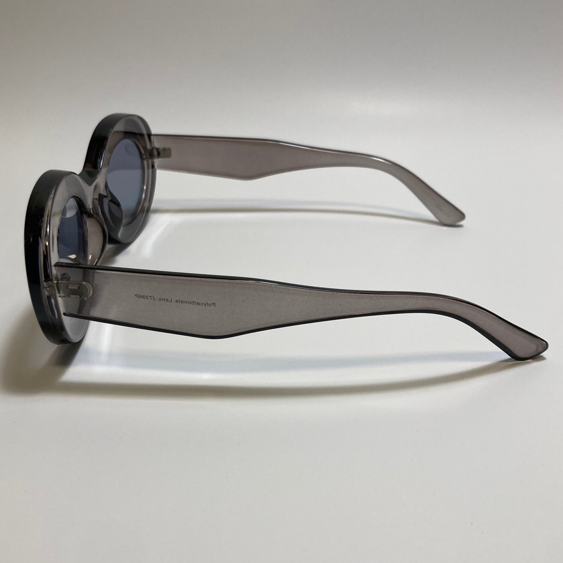 clear gray round womens MCM sunglasses with chunky frame