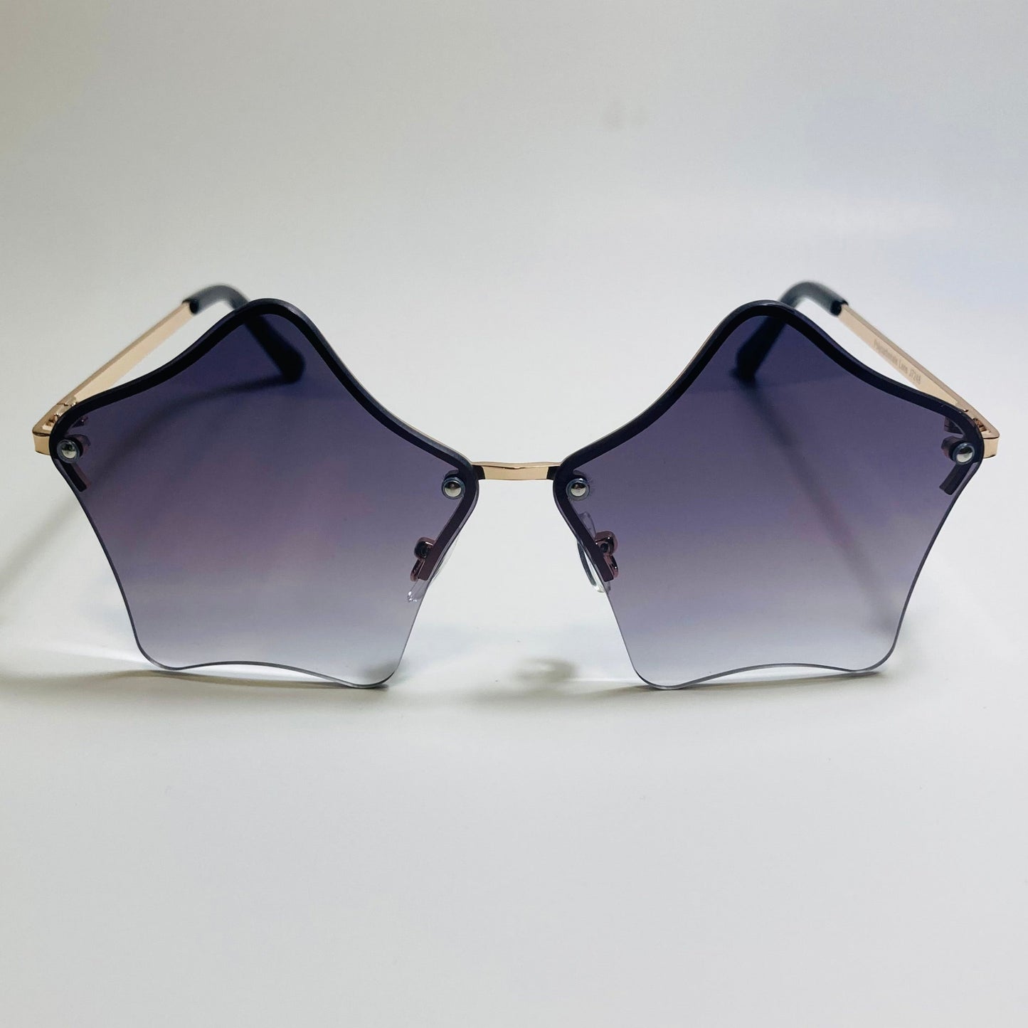womens black and gold star sunglasses with metal frame