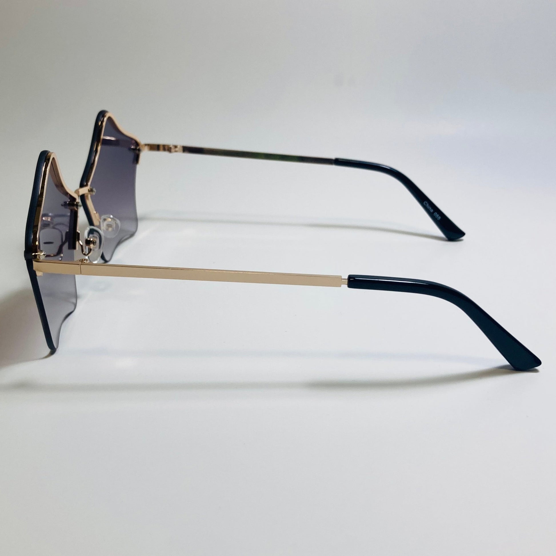 womens black and gold star sunglasses with metal frame