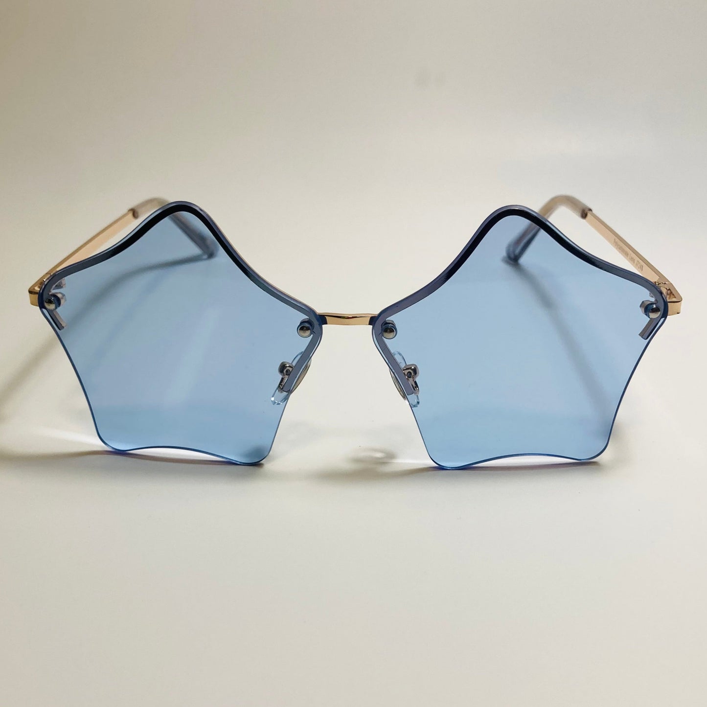 womens blue and gold star sunglasses with metal frame