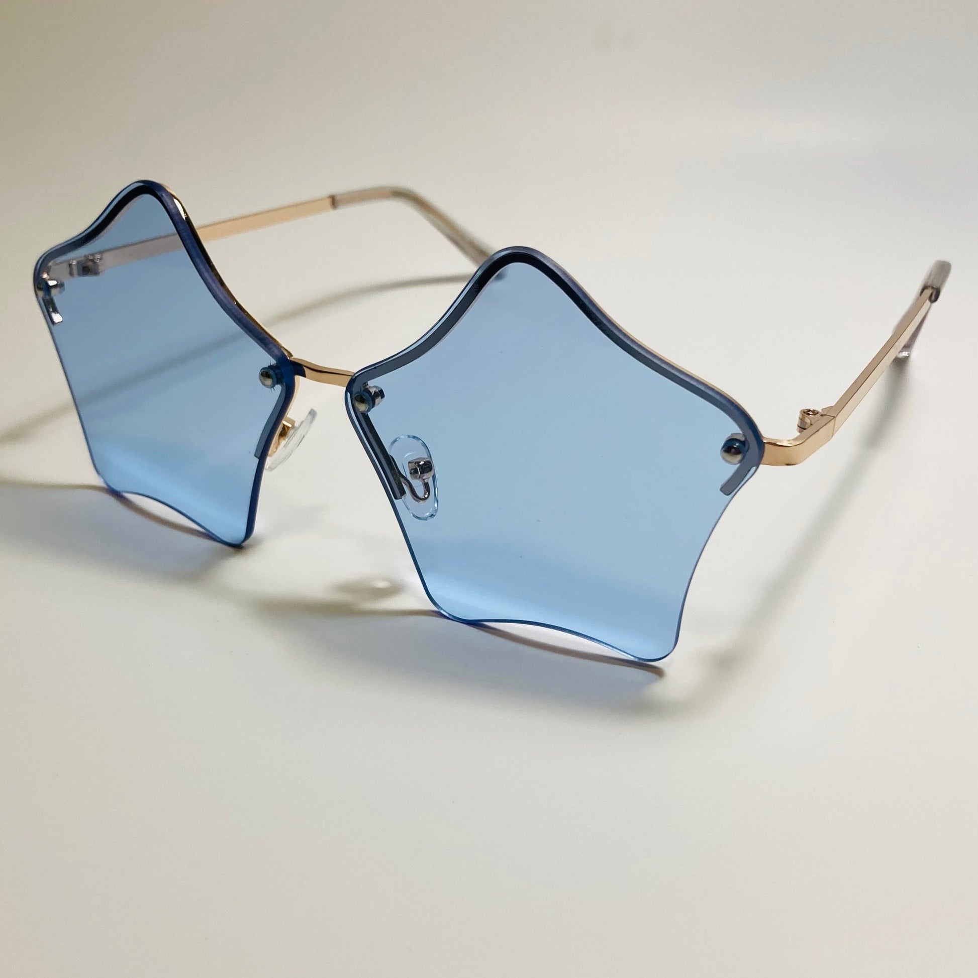 womens blue and gold star sunglasses with metal frame