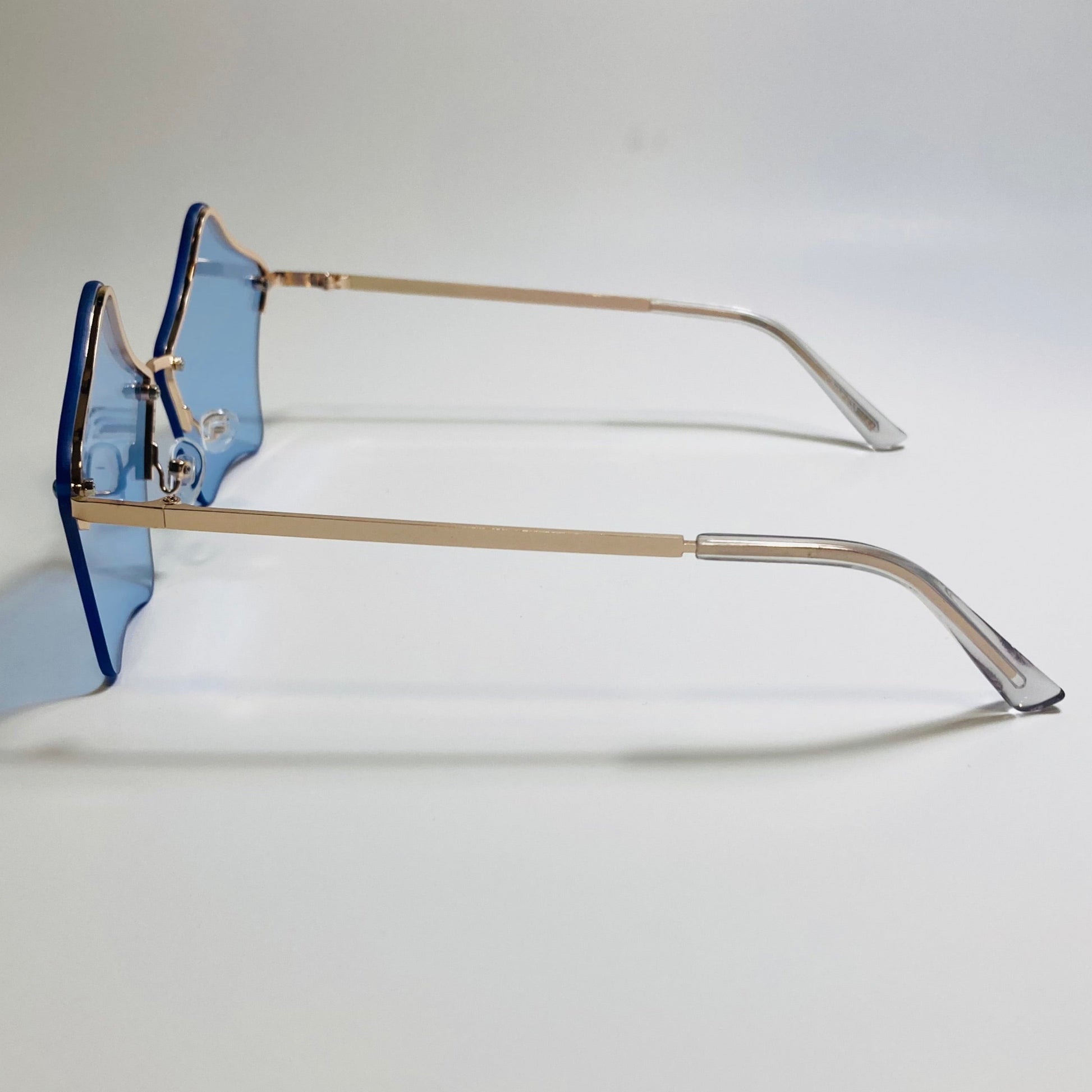 womens blue and gold star sunglasses with metal frame