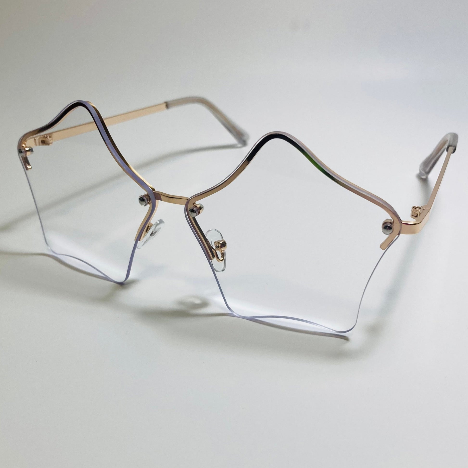 womens clear and gold star sunglasses with metal frame