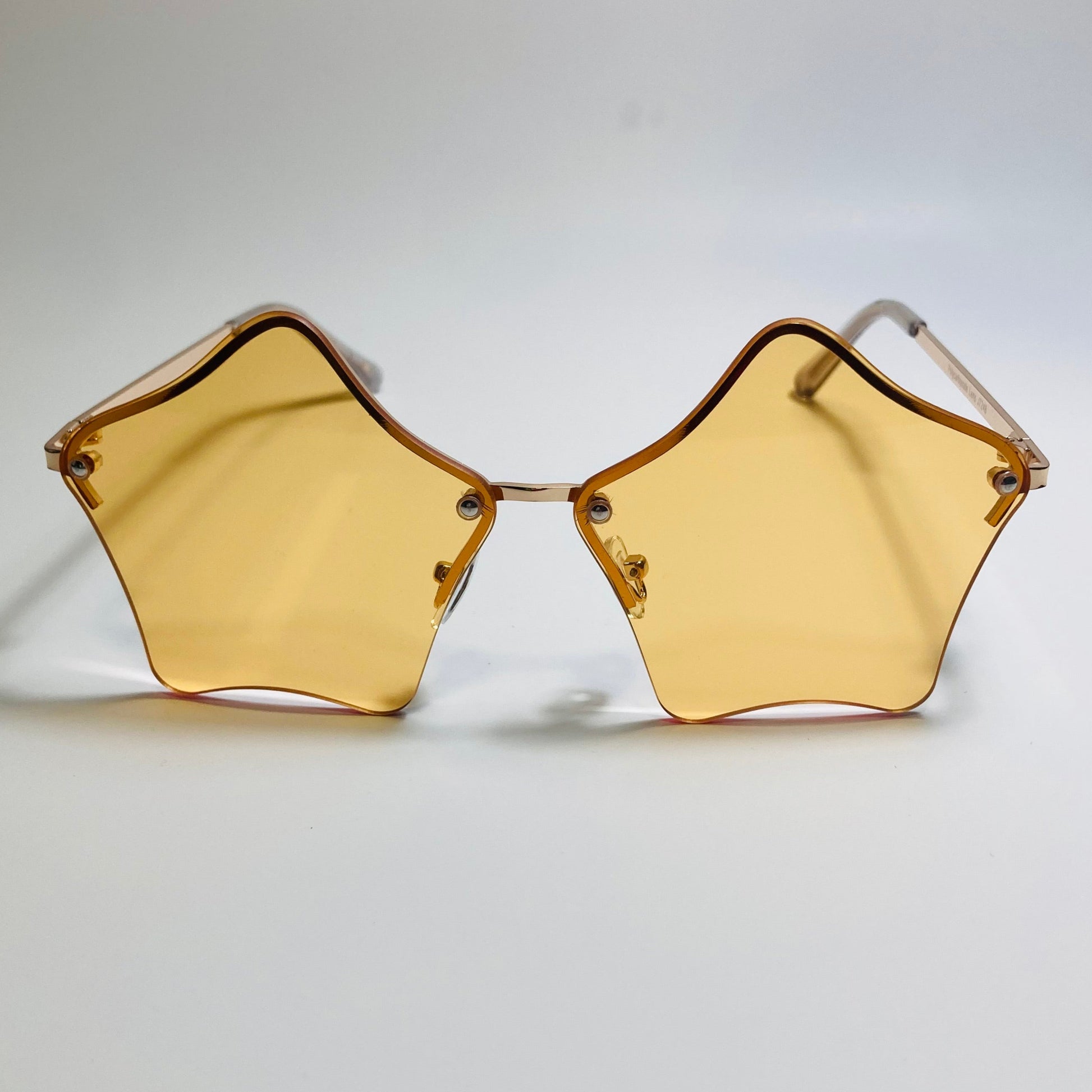 womens orange and gold star sunglasses with metal frame