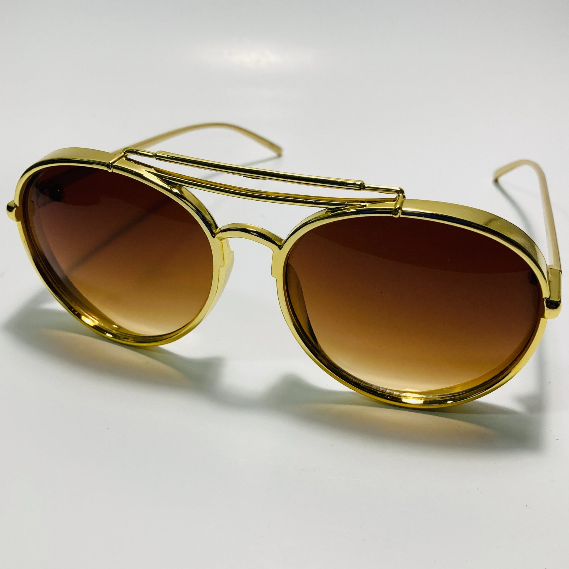 brown and gold elvis sunglasses