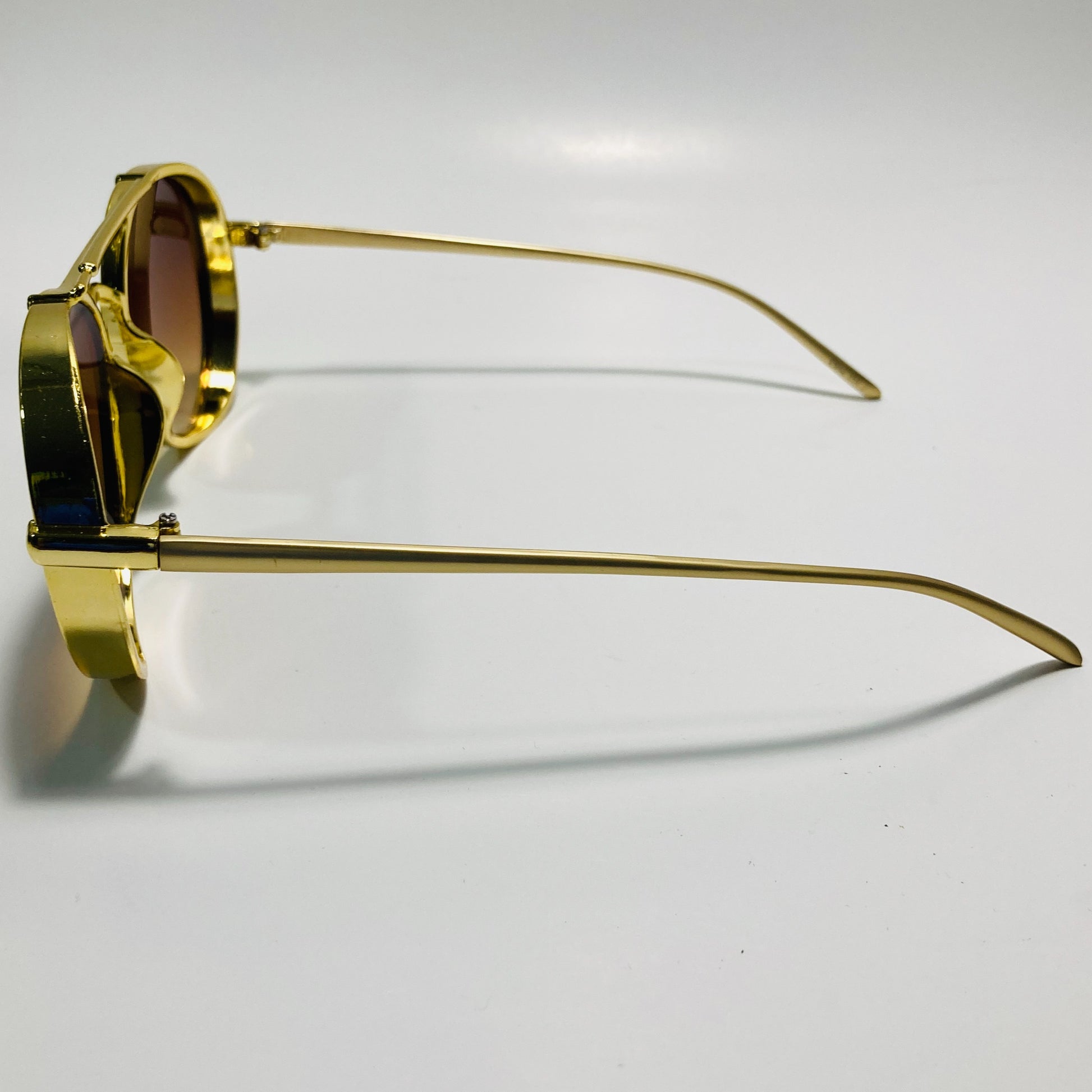 brown and gold elvis sunglasses