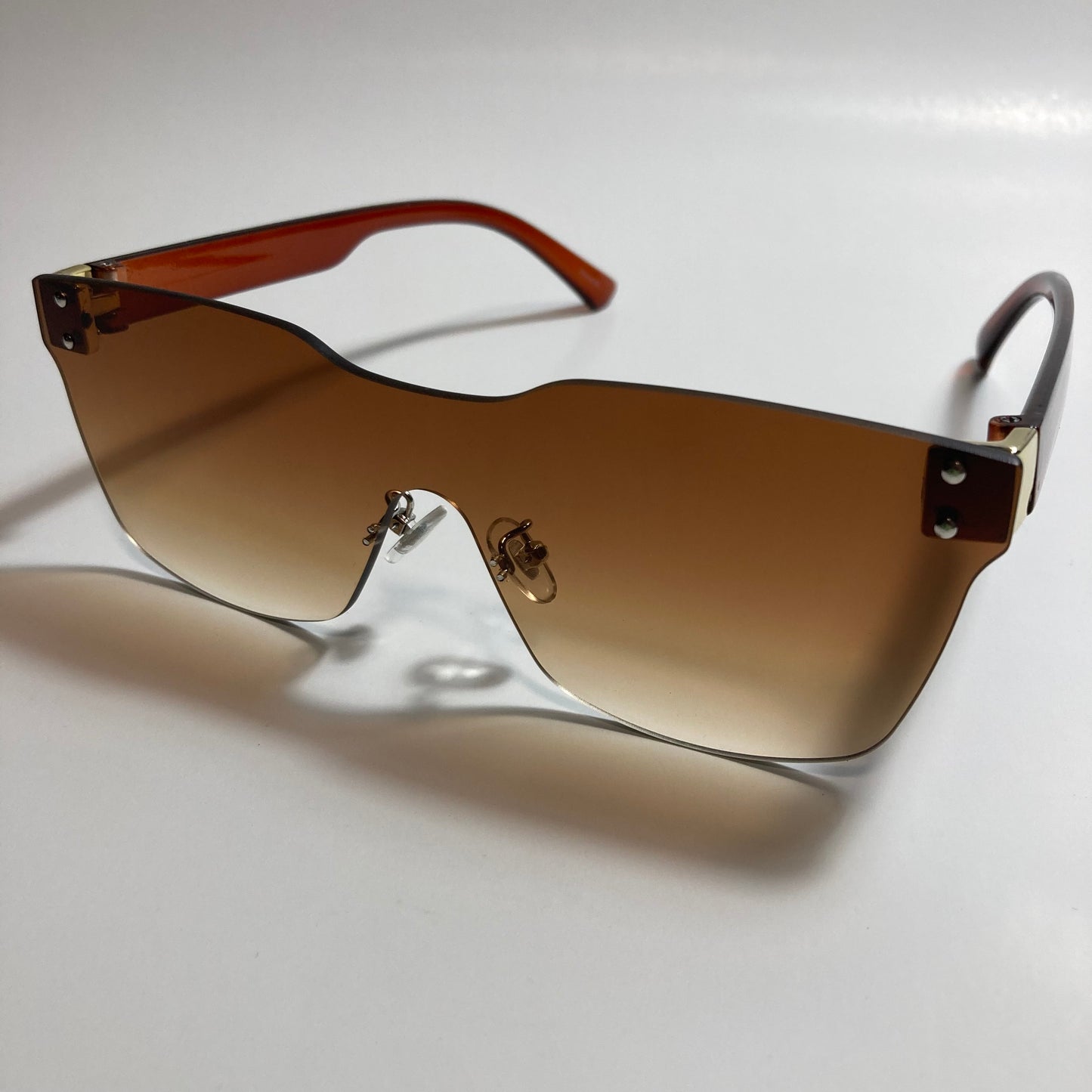 brown rimless square womens sunglasses