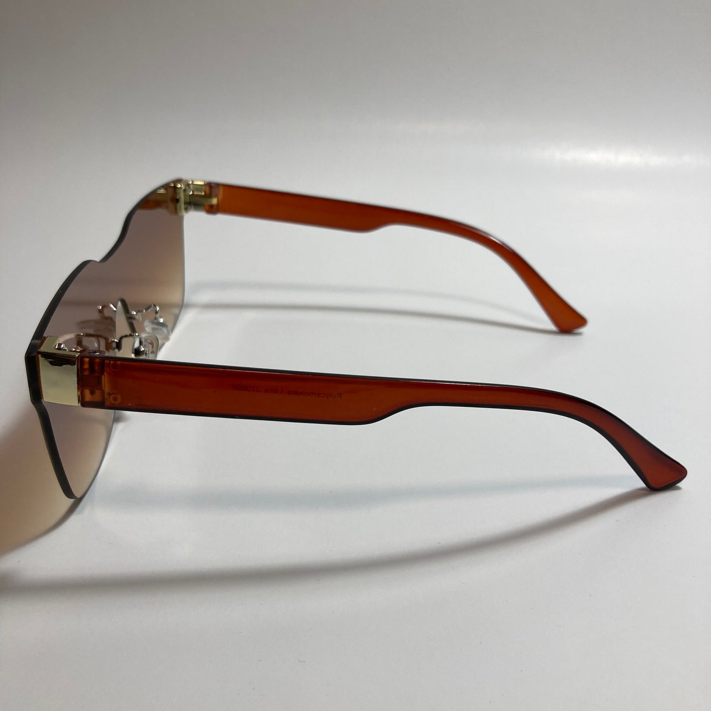 brown rimless square womens sunglasses