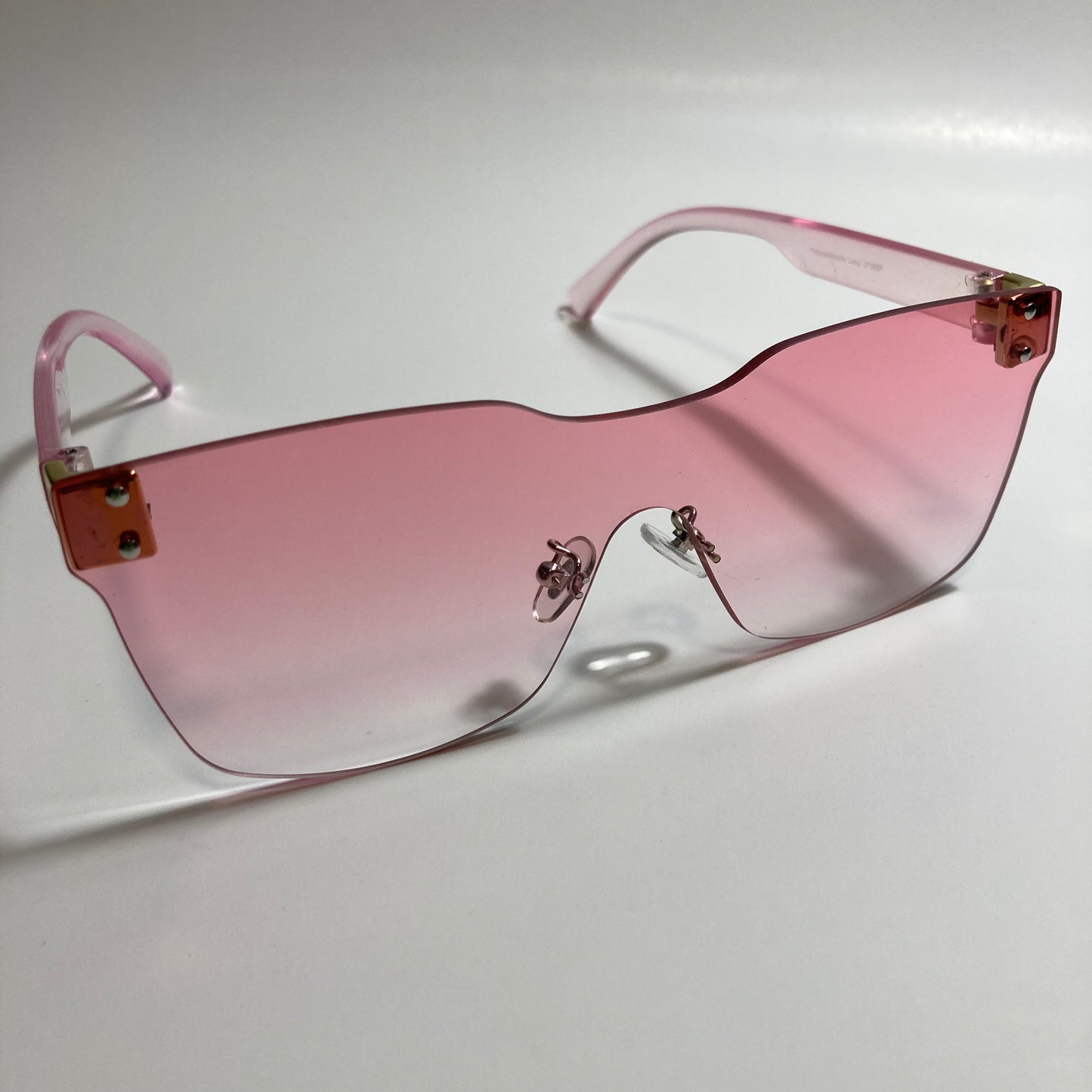 pink rimless square womens sunglasses