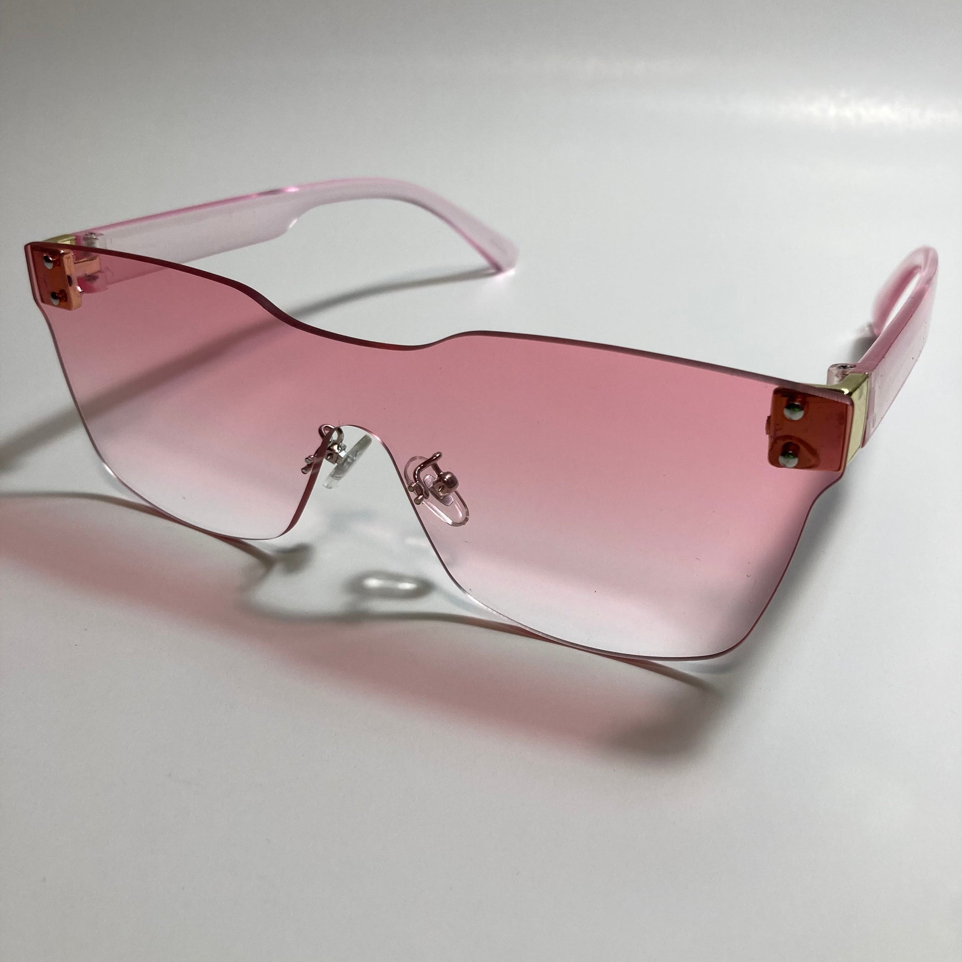 pink rimless square womens sunglasses