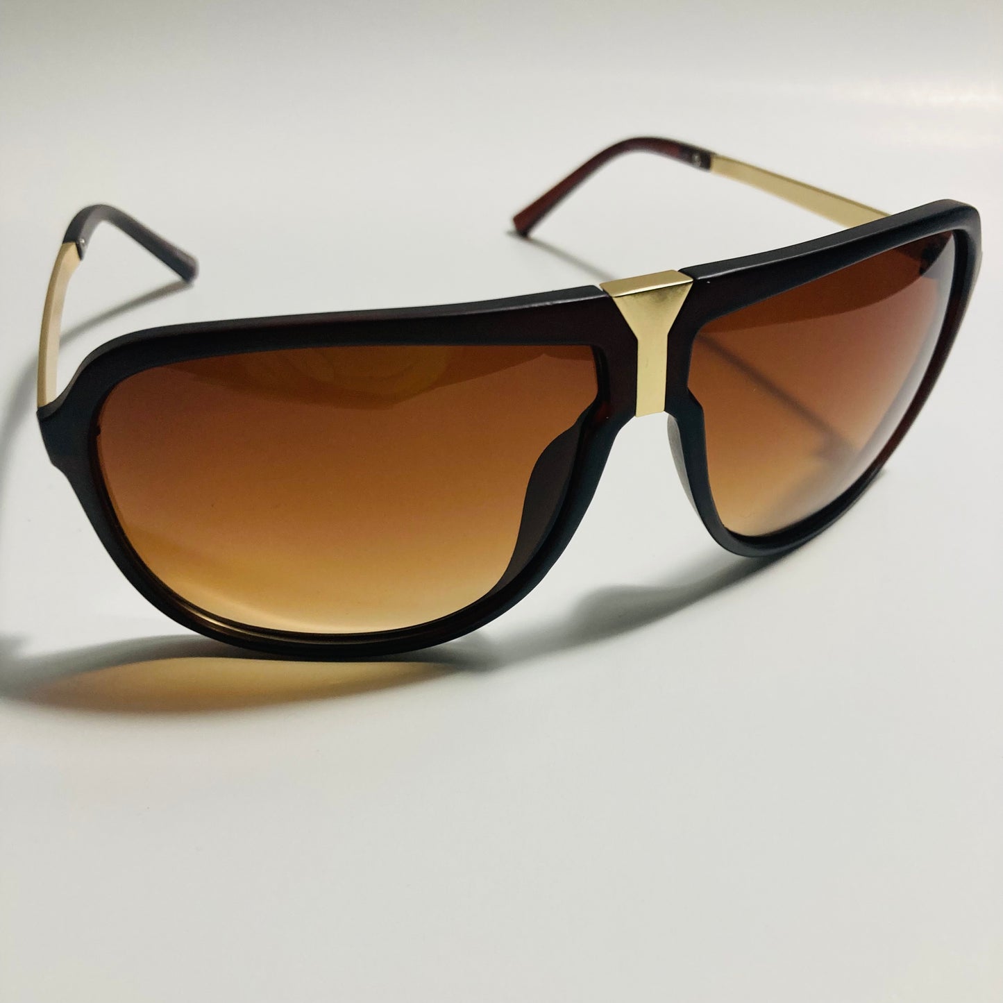 mens and womens brown and gold aviator sunglasses