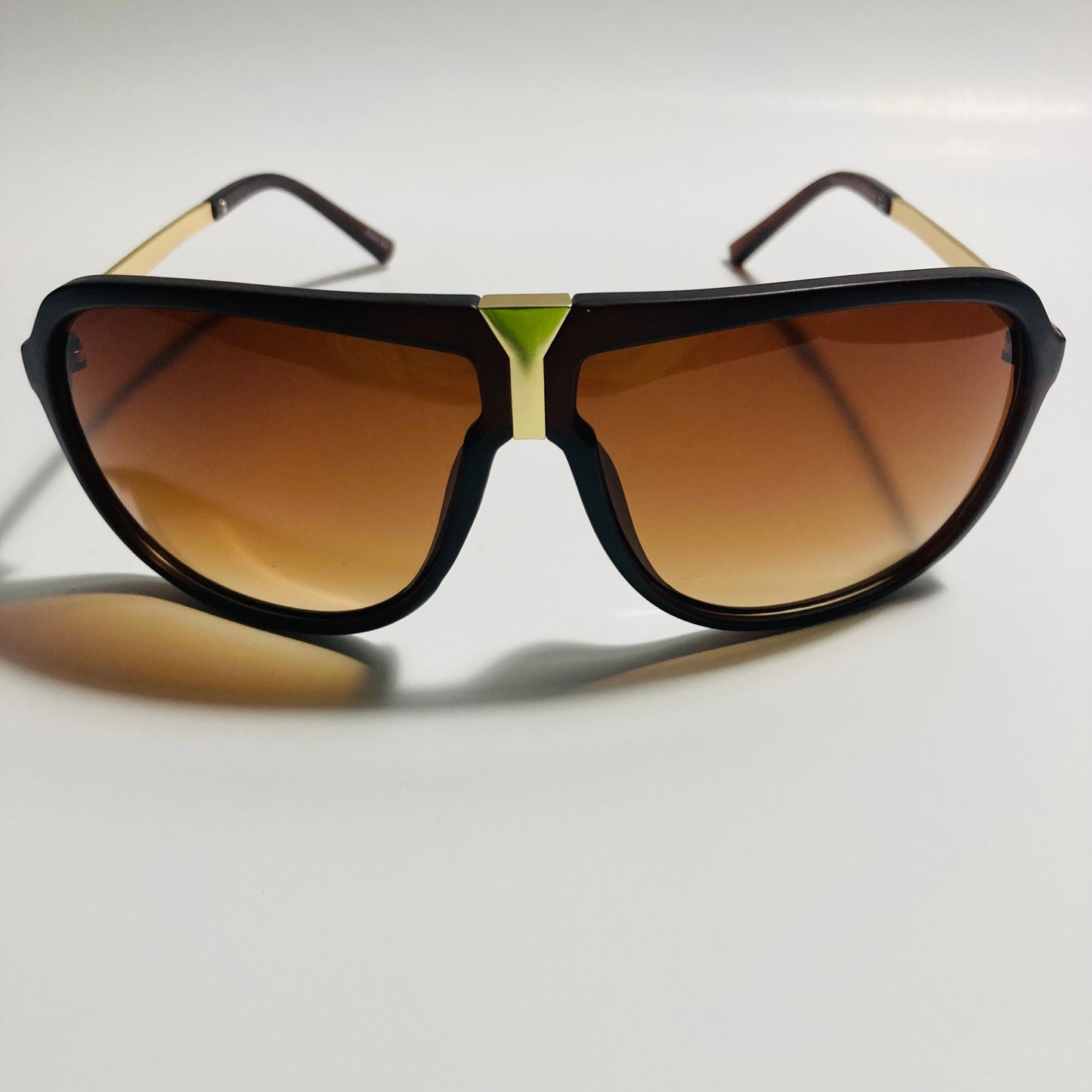 mens and womens brown and gold aviator sunglasses