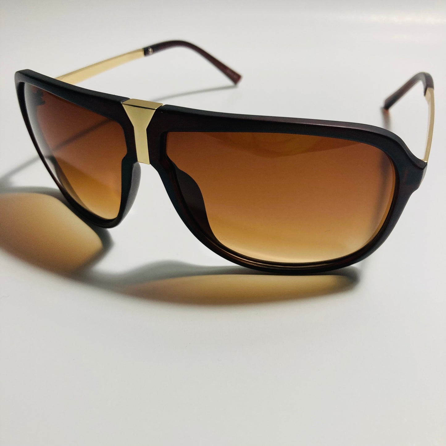 mens and womens brown and gold aviator sunglasses
