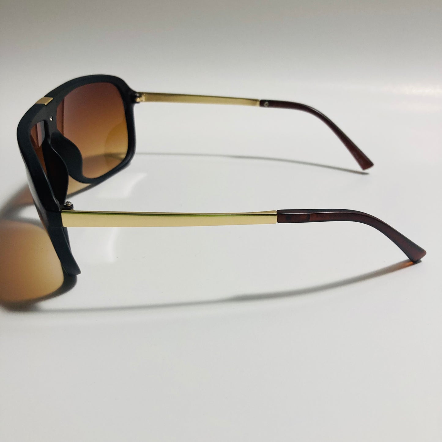 mens and womens brown and gold aviator sunglasses