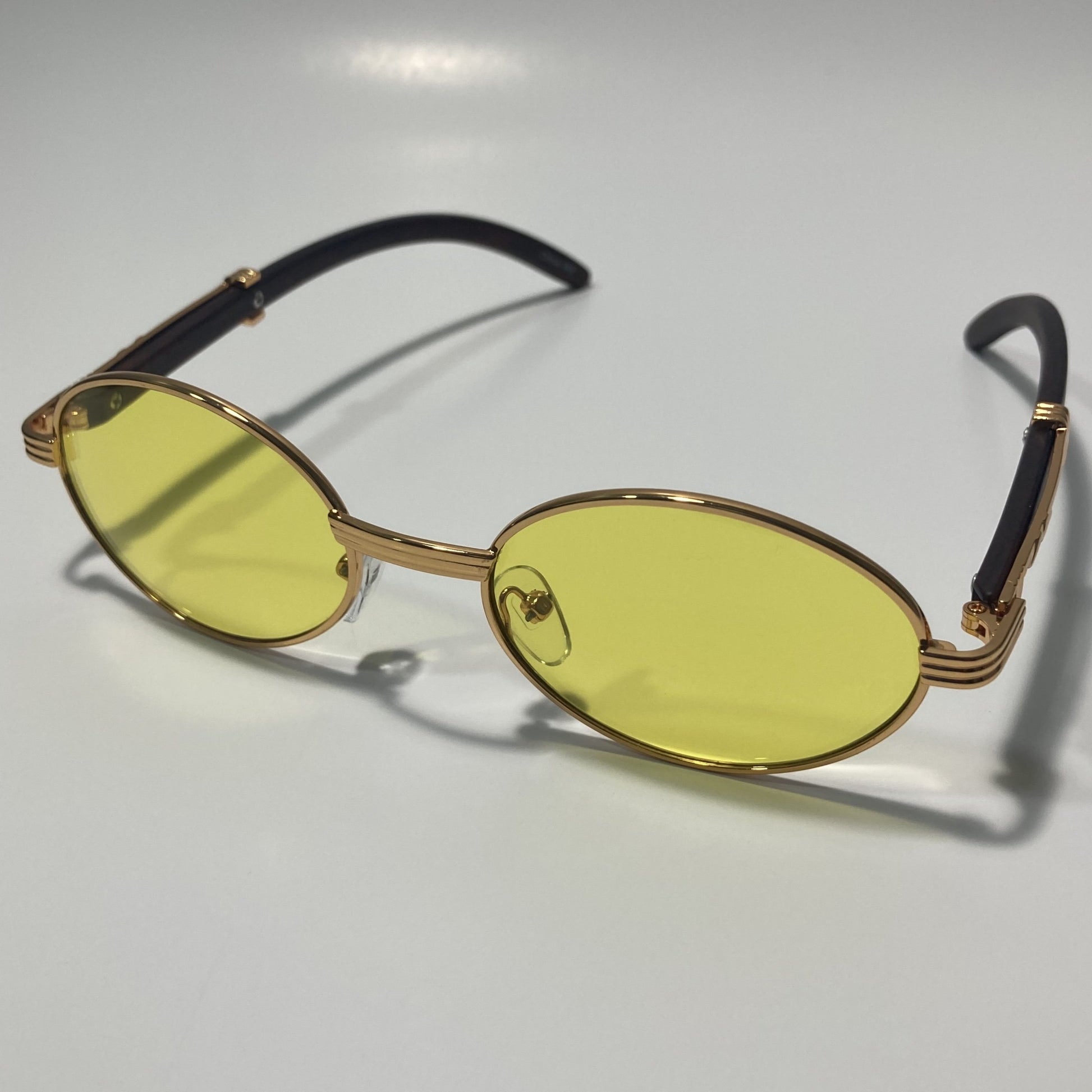 mens and womens yellow and gold round sunglasses
