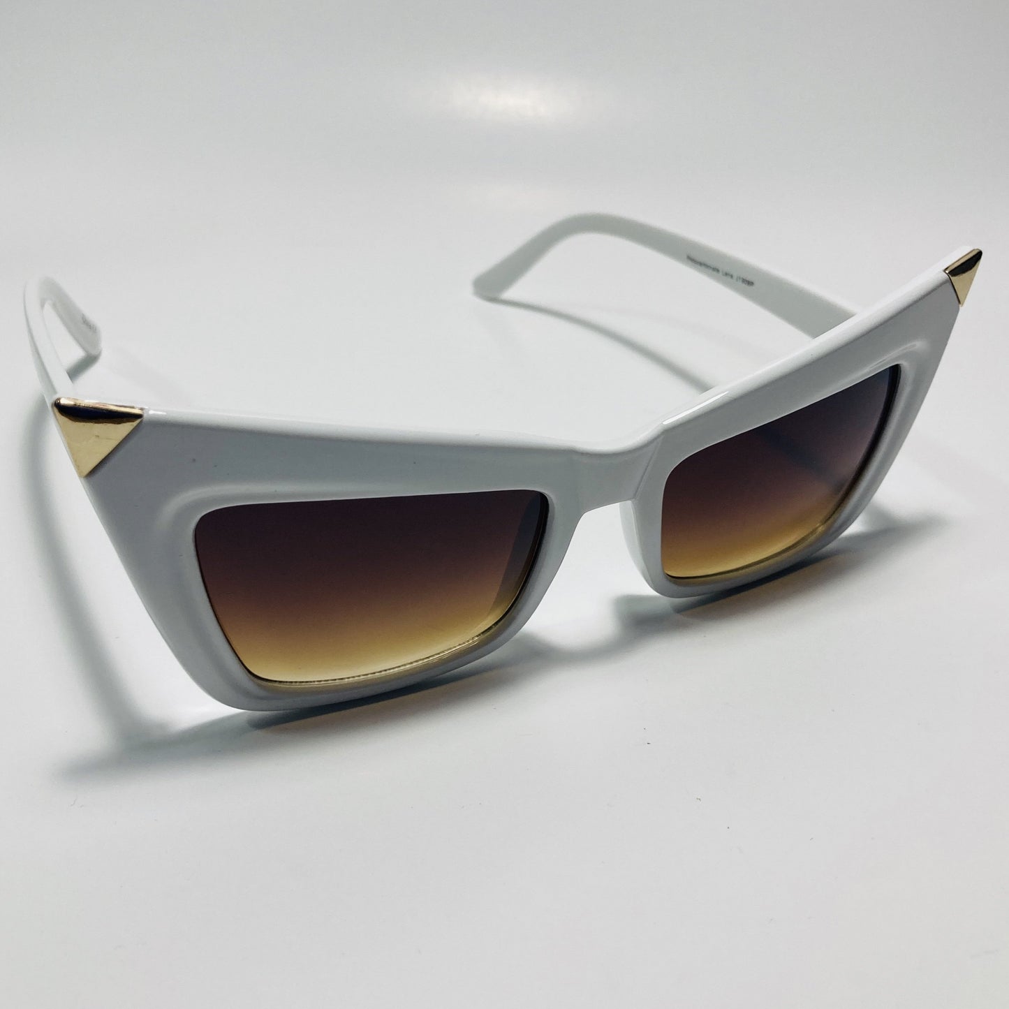 white and brown goth sunglasses
