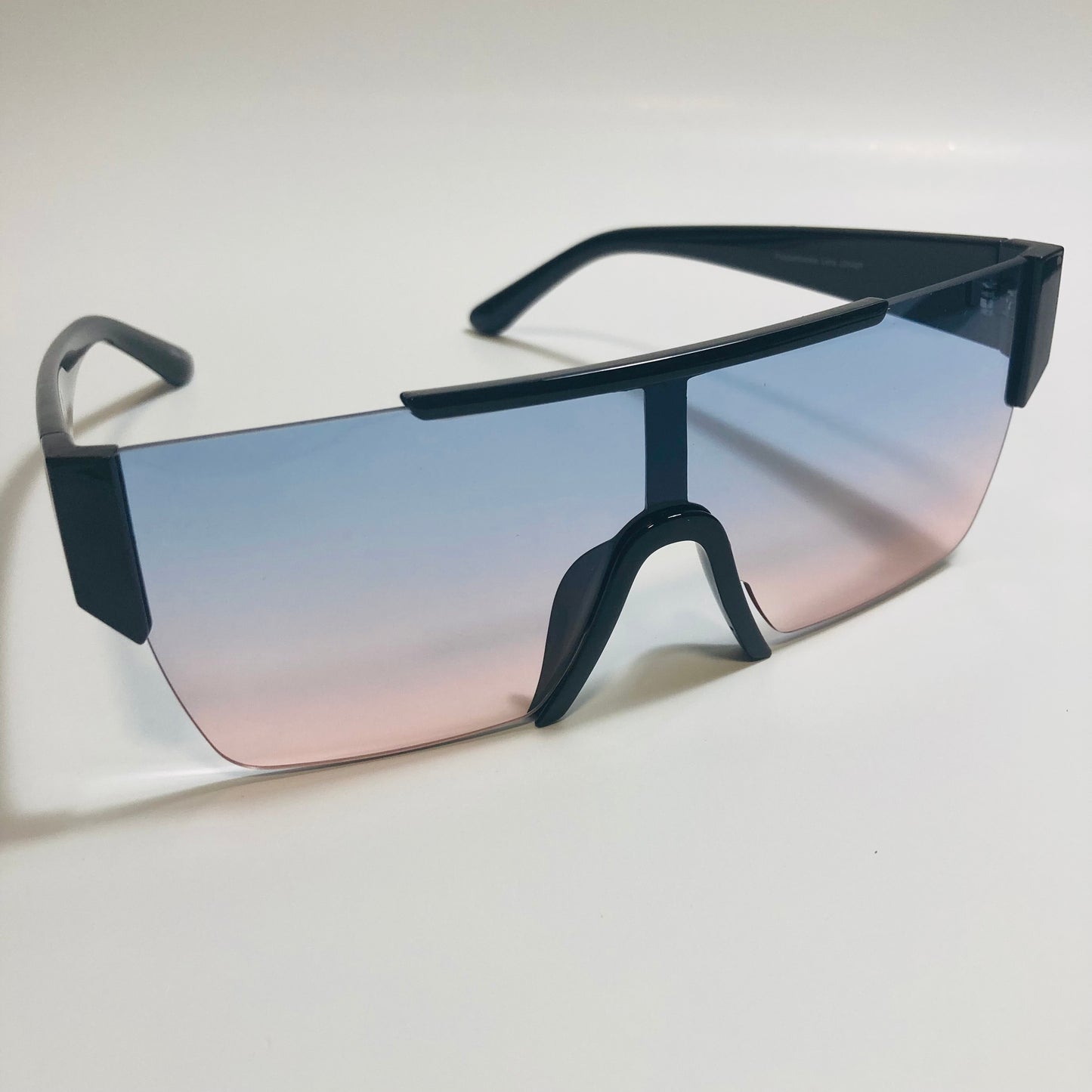 womens and mens blue and pink half rim square sunglasses