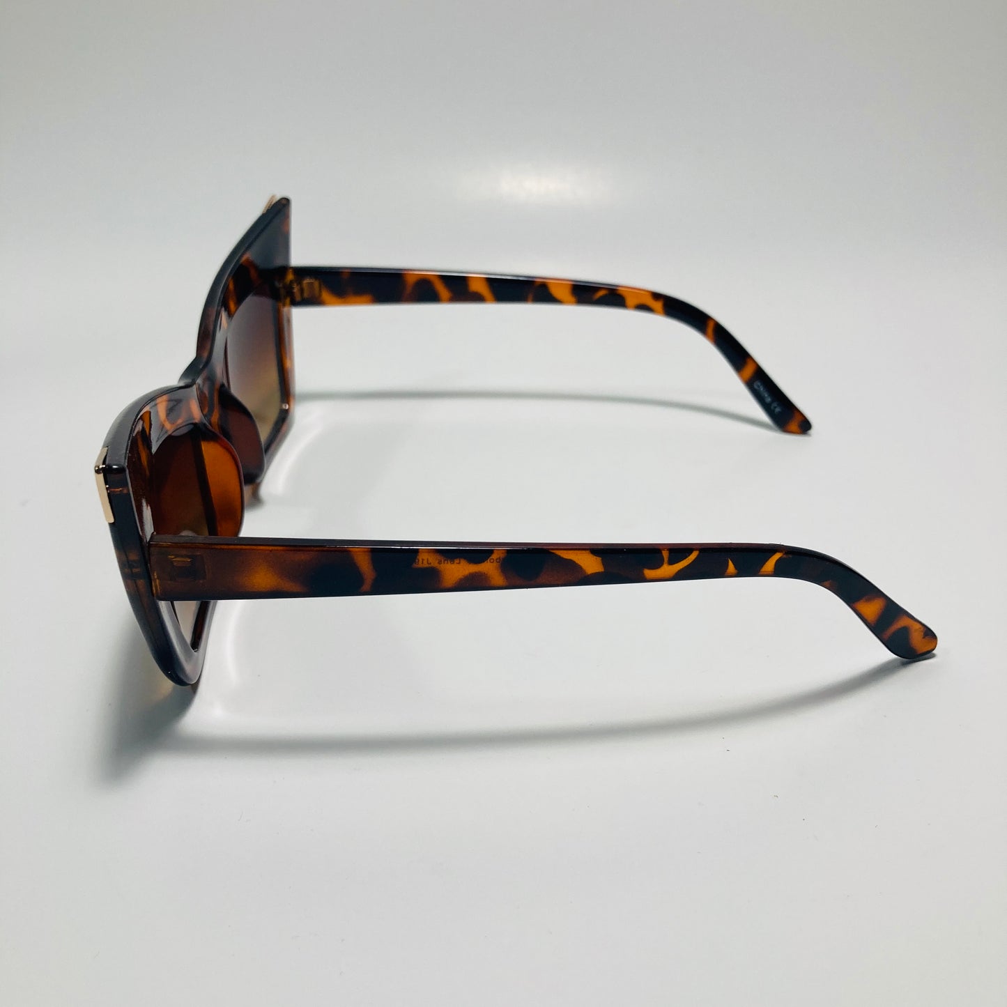 brown goth sunglasses