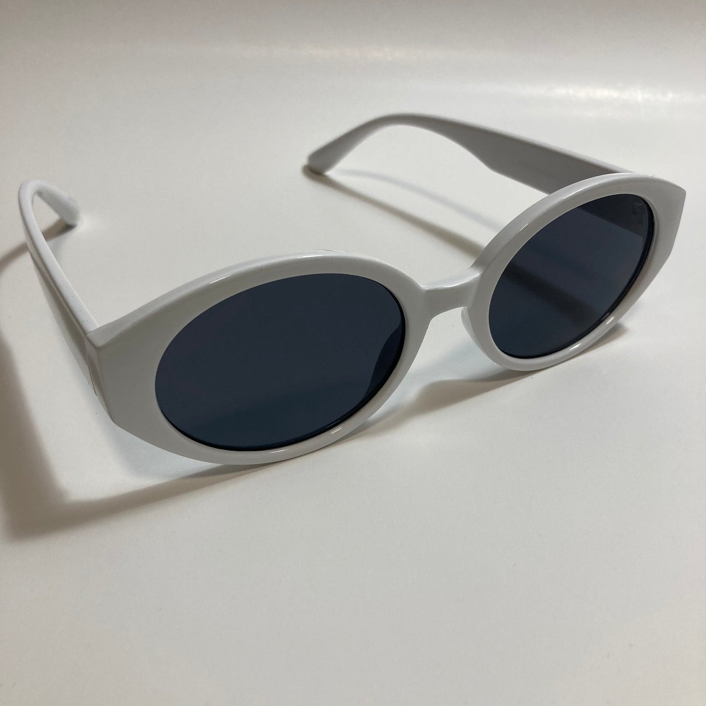 white and black womens round sunglasses