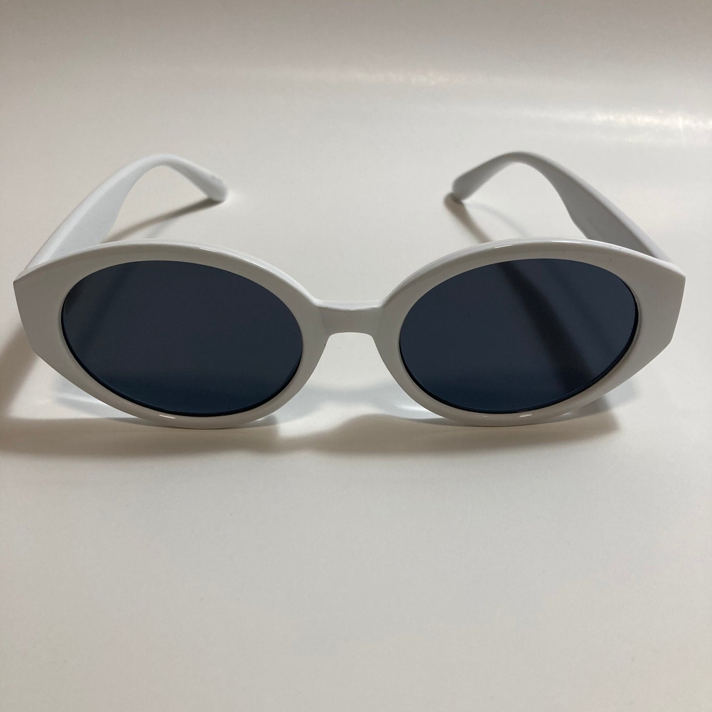 white and black womens round sunglasses