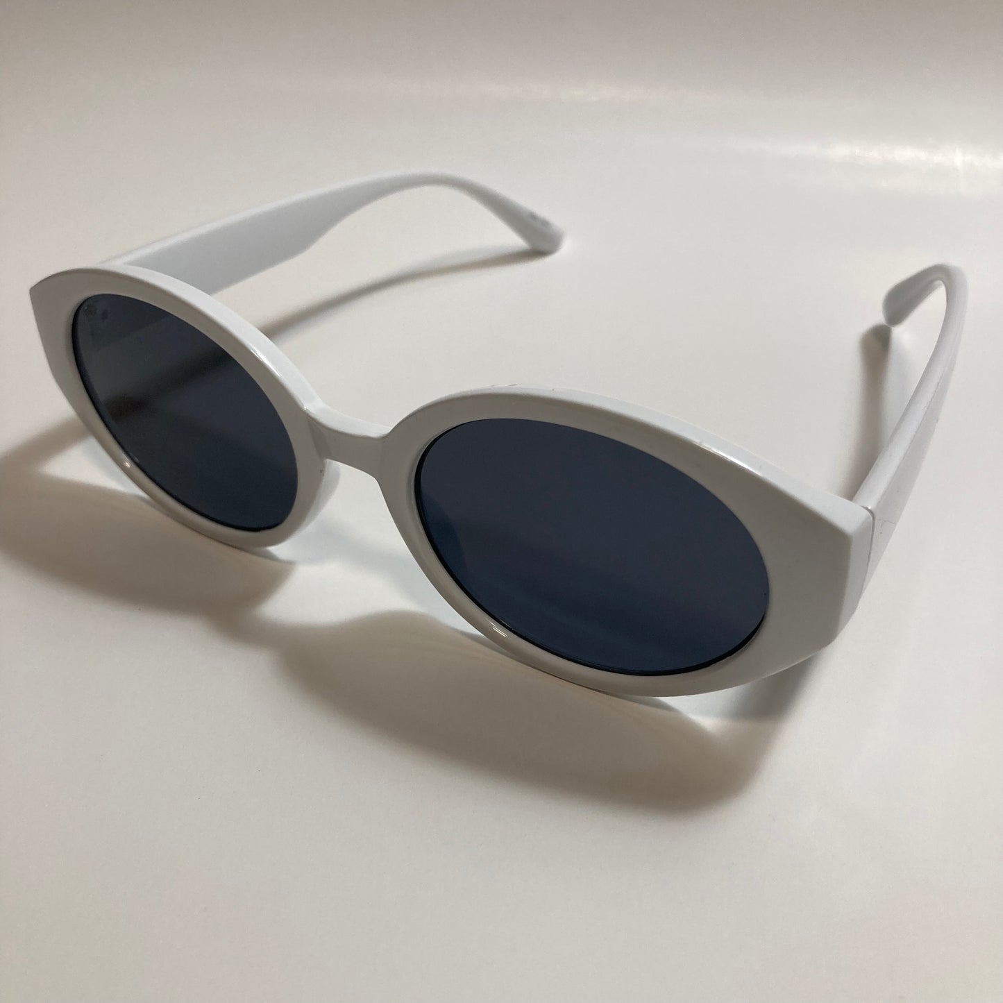 white and black womens round sunglasses