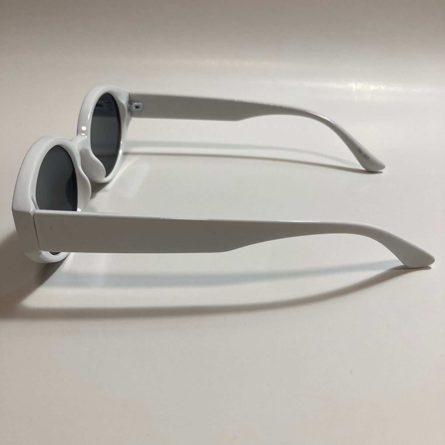 white and black womens round sunglasses