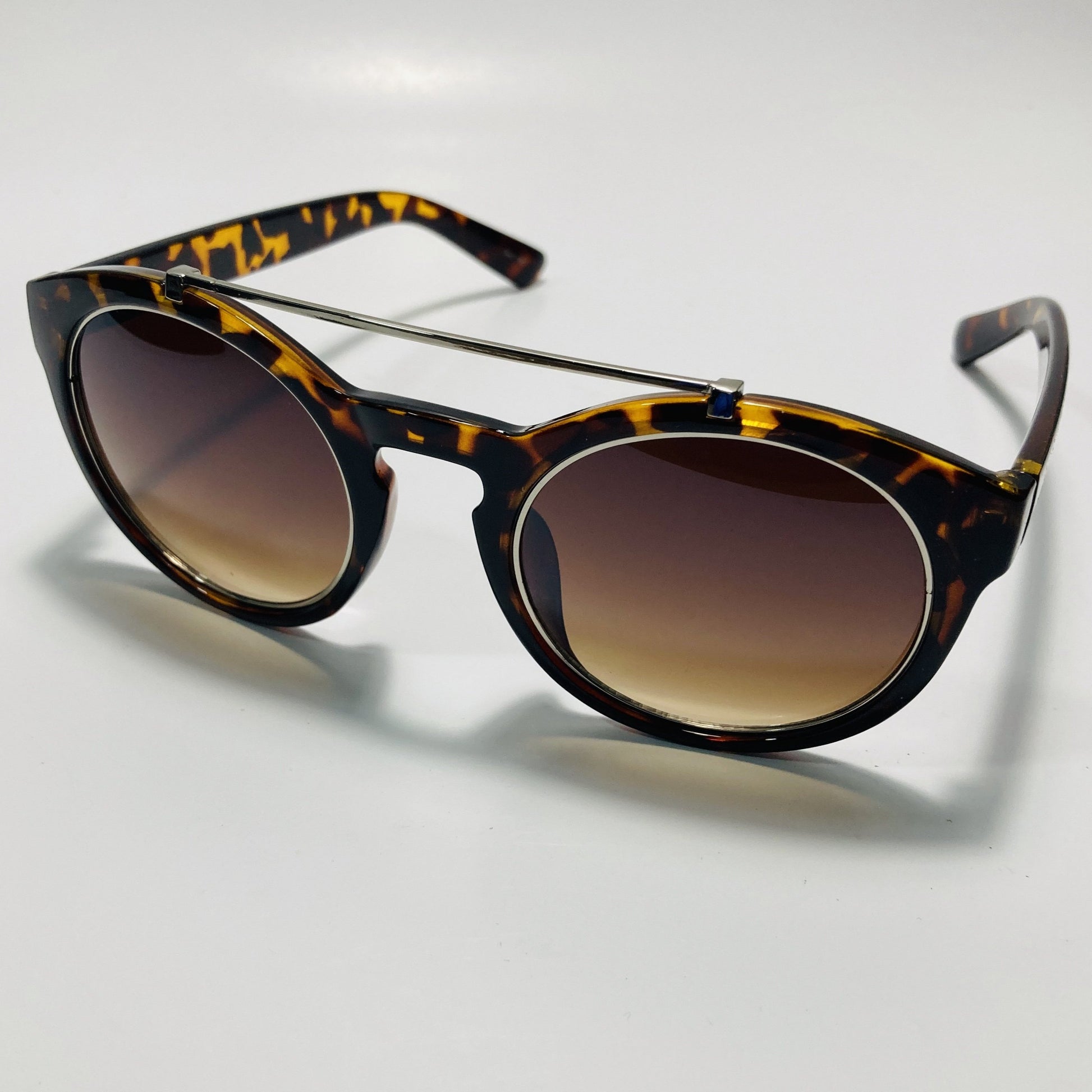Keywords: Tortoise Sunglasses, Gold Sunglasses, Italian Sunglasses, Chic Sunglasses, Affordable Sunglasses, Cheap Sunglasses, Round Sunglasses, Circular Sunglasses, Circle Sunglasses, Gradient Lens Sunglasses, Ombre Lens Sunglasses, Tiger Sunglasses, White Sunglasses, Silver Sunglasses, New York Sunglasses, NYC Sunglasses, Shade Phreak Sunglasses, Shade Phreak, The Alegrissimo Sunglasses, Italian Design Sunglasses, Shade Phreak Sunglasses Company, Shade Phreak Sunglass Co.