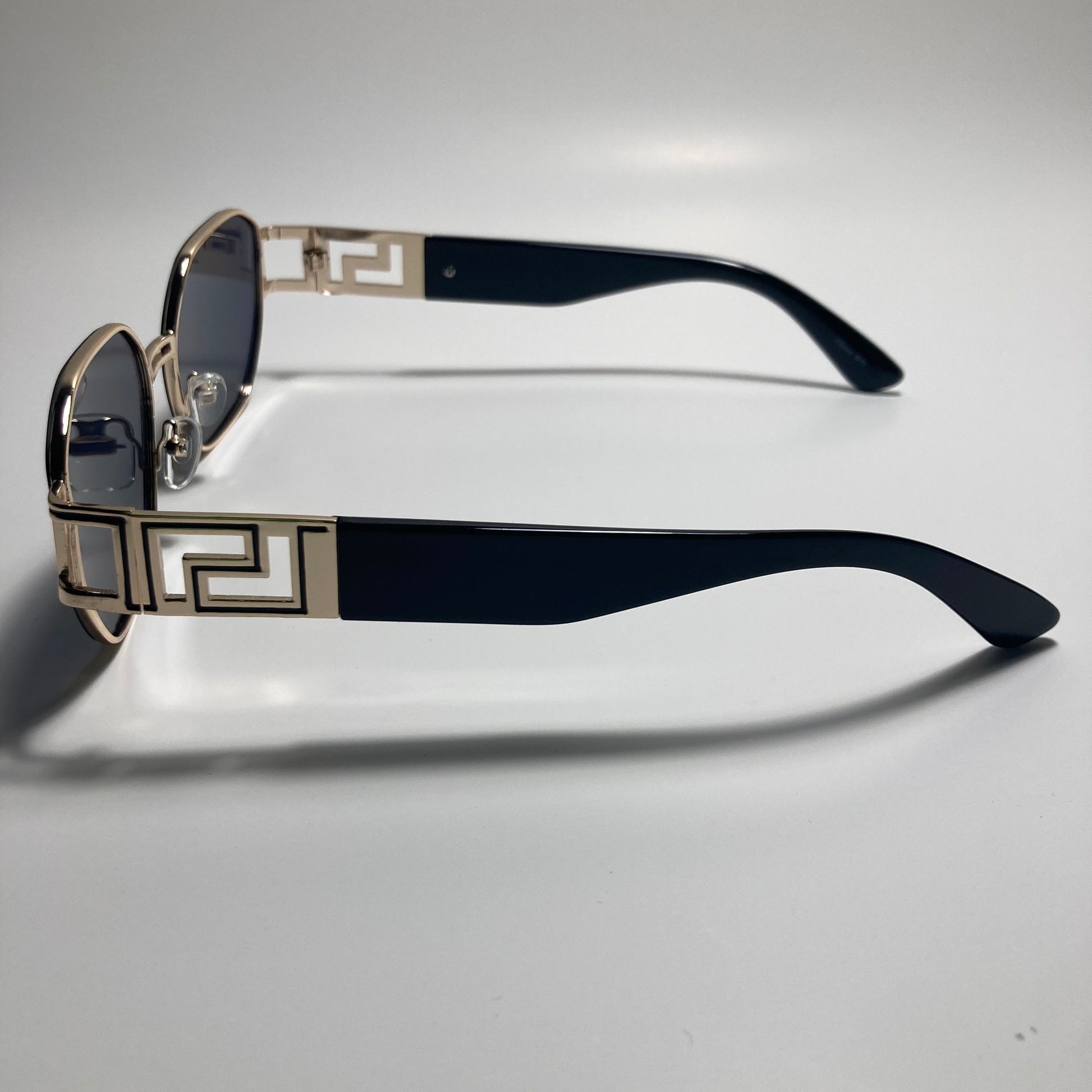 mens and womens black and gold square sunglasses