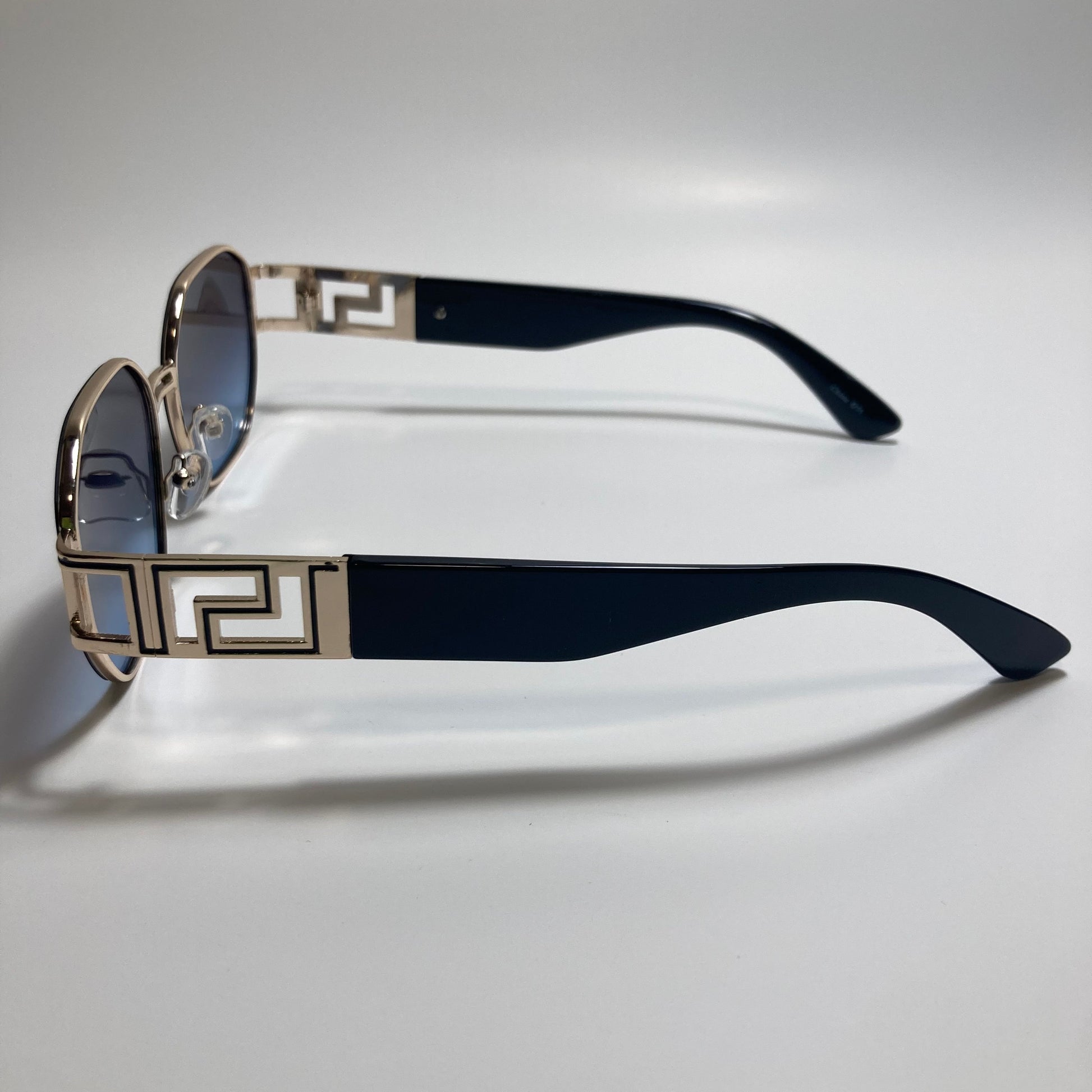 mens and womens black and gold square sunglasses