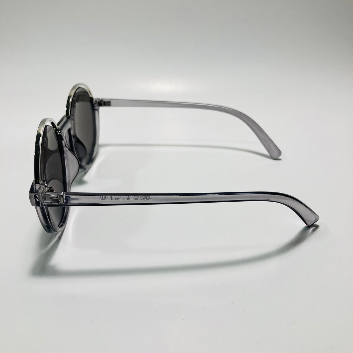 womens gray and silver round sunglasses