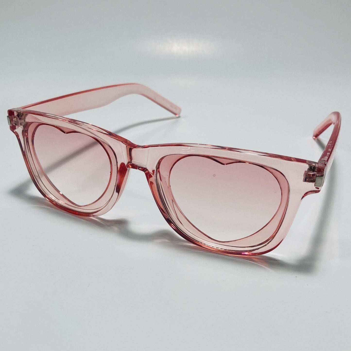 pink womens heart shape sunglasses with clear frame
