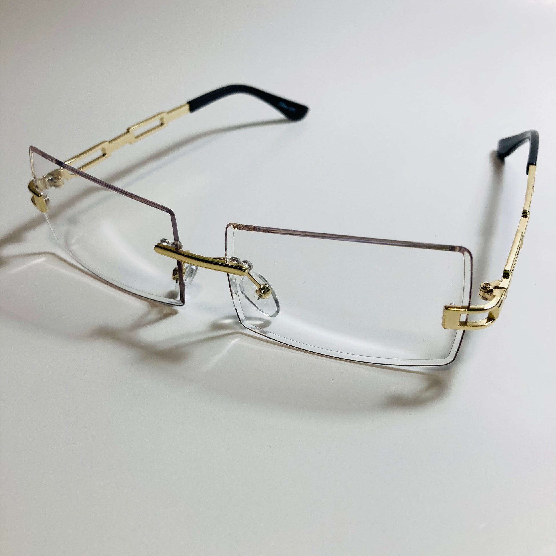 mens and womens clear and gold rimless square fake glasses