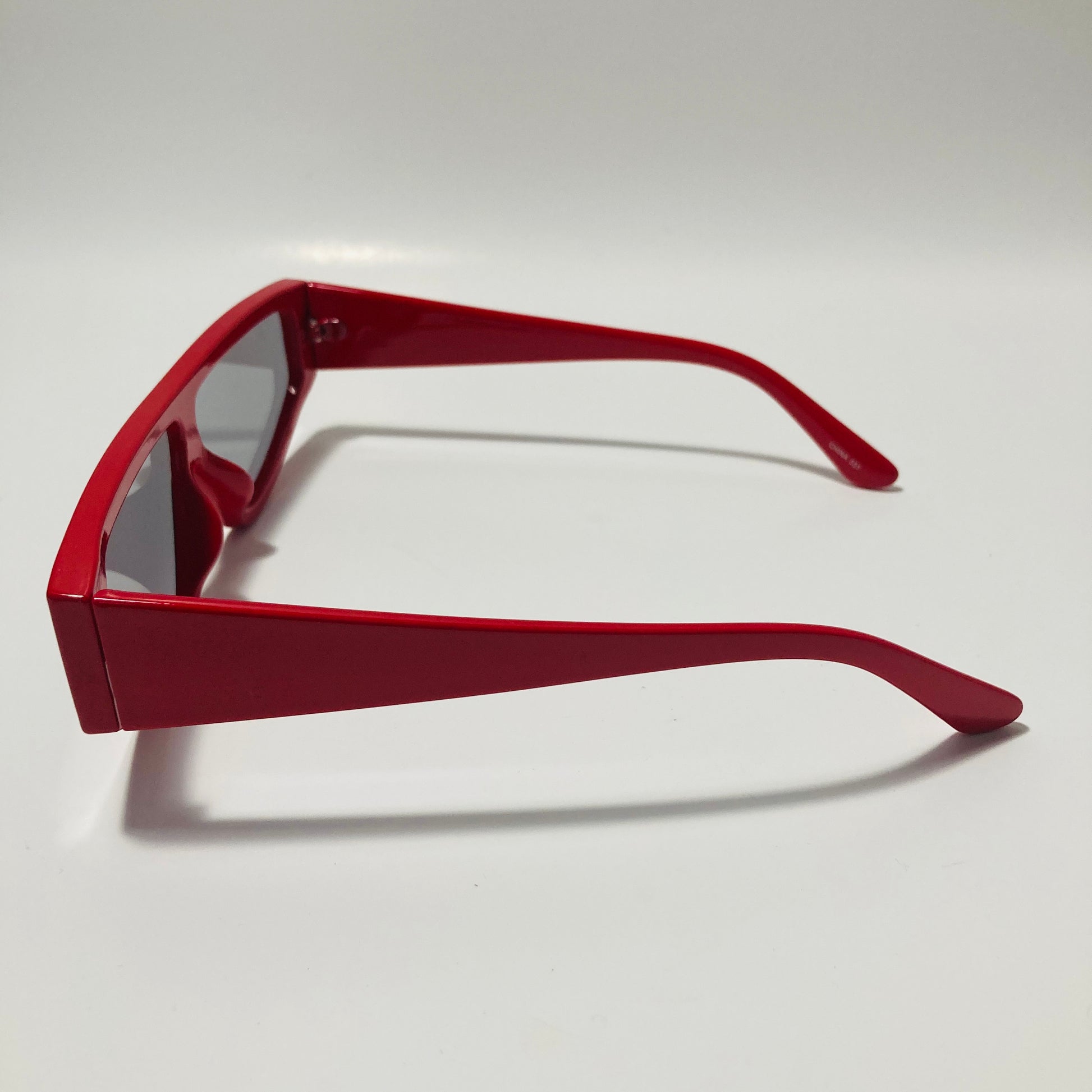 mens and womens red futuristic sunglasses with black lenses