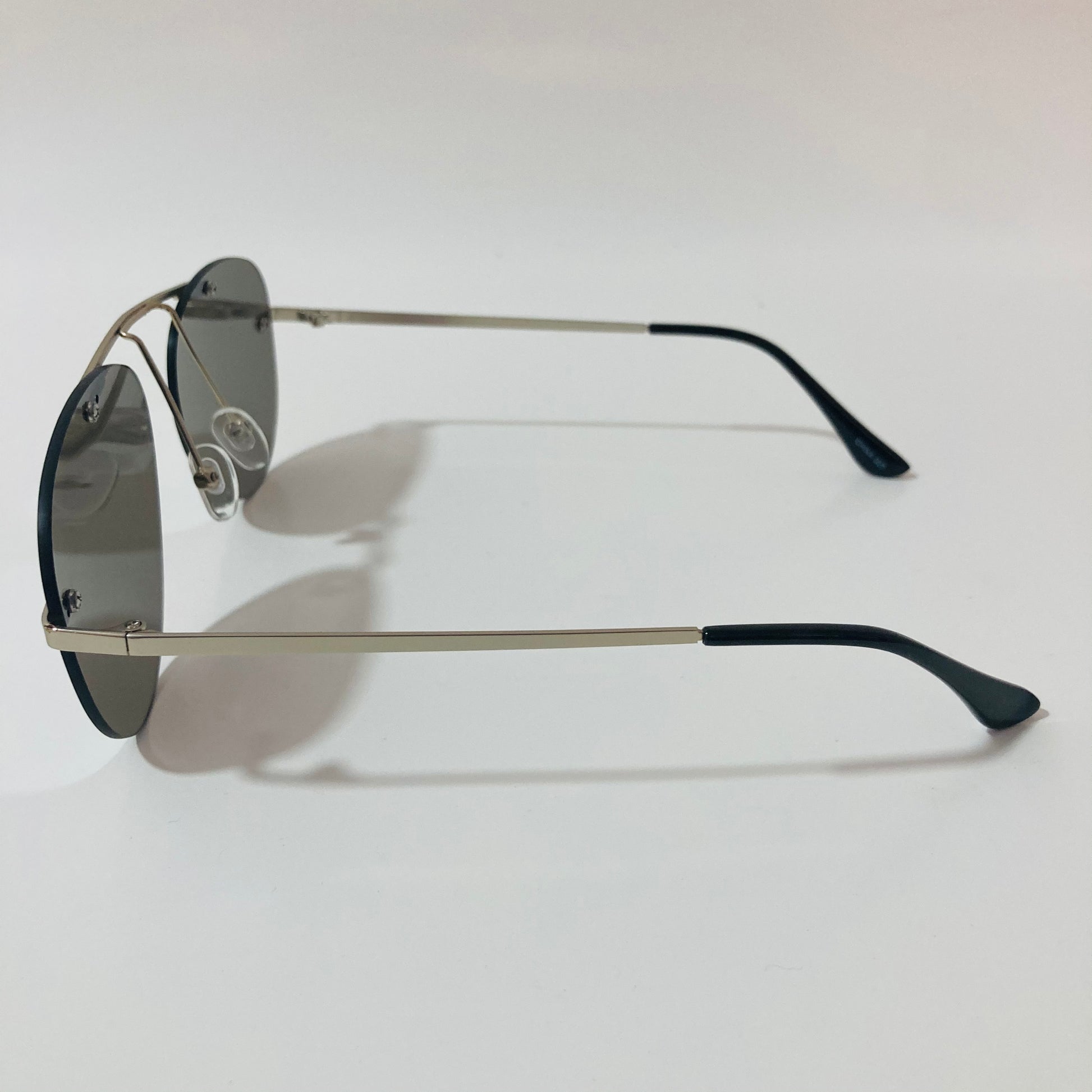 silver rimless aviator sunglasses with silver mirror lenses