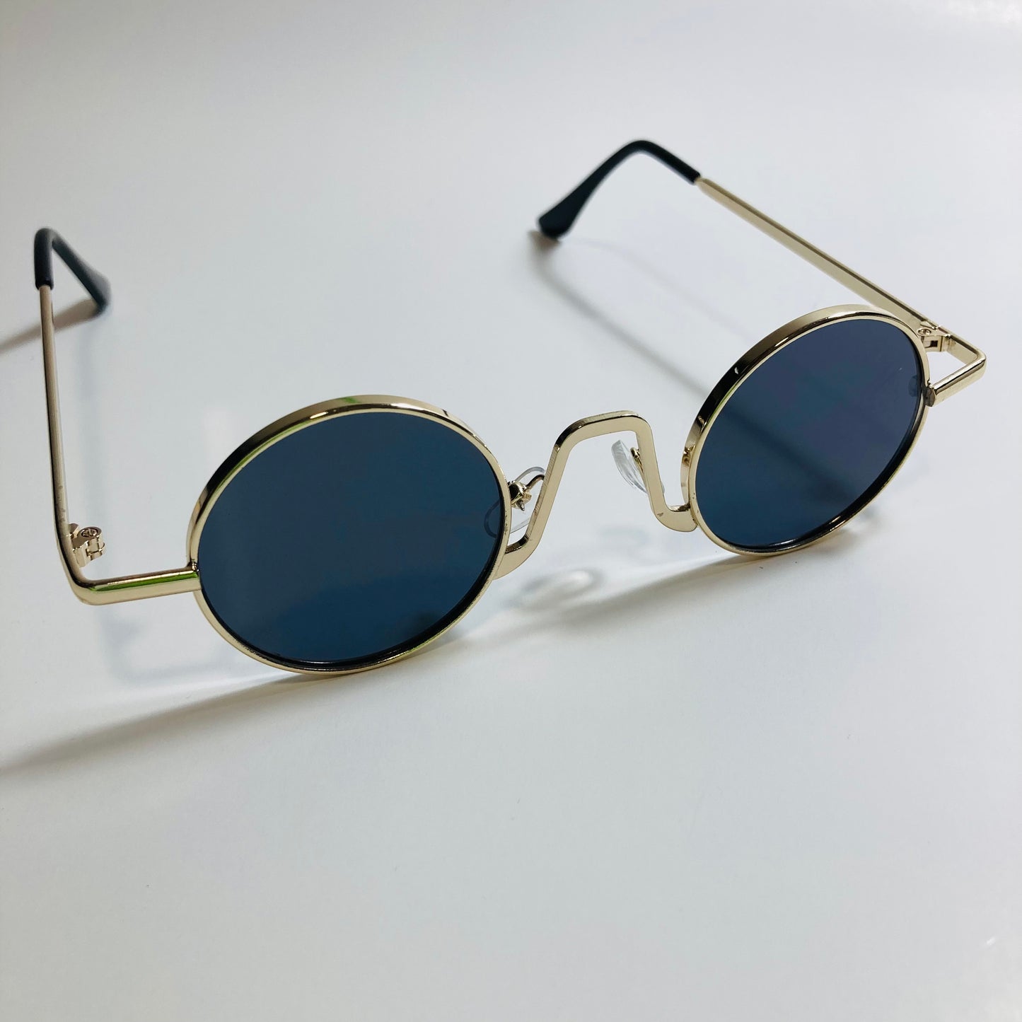 womens and mens gold and black ozzy osbourne sunglasses