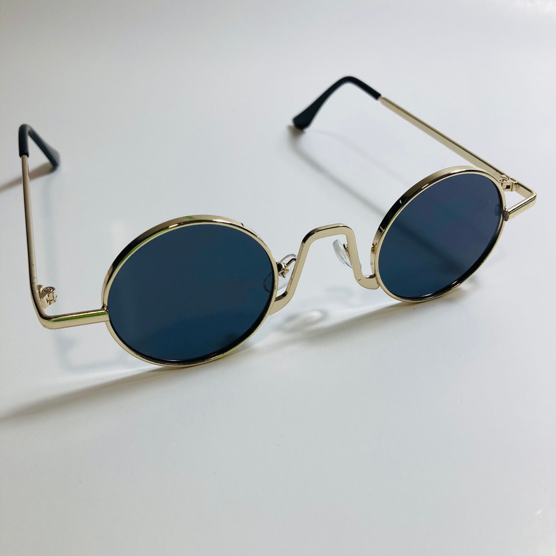 womens and mens gold and black ozzy osbourne sunglasses