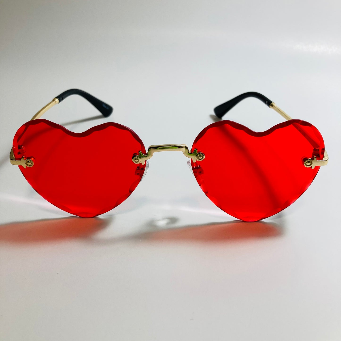 womens gold and red heart shape sunglasses