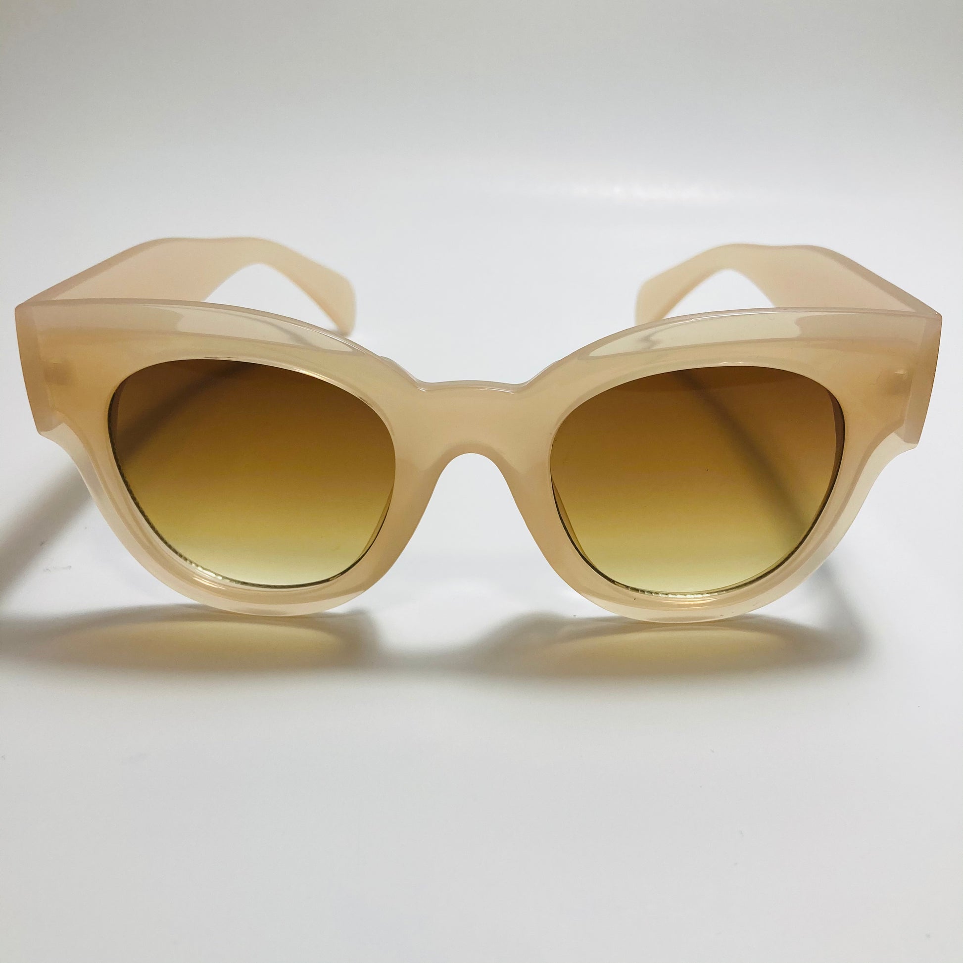 tan and brown womens round oversize sunglasses