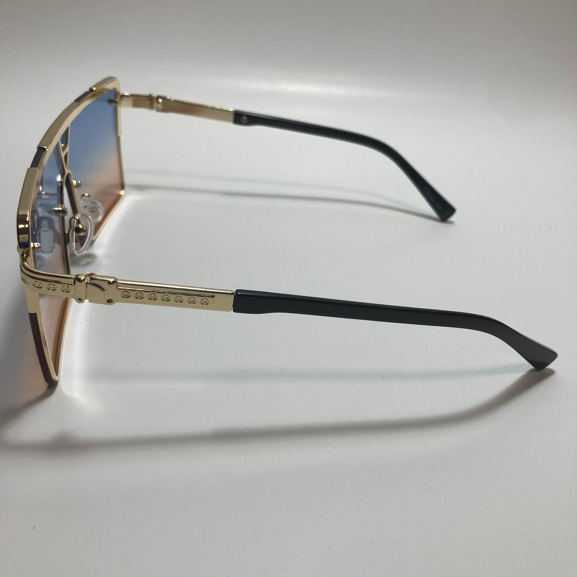 womens gold square oversize sunglasses with pink and blue lenses