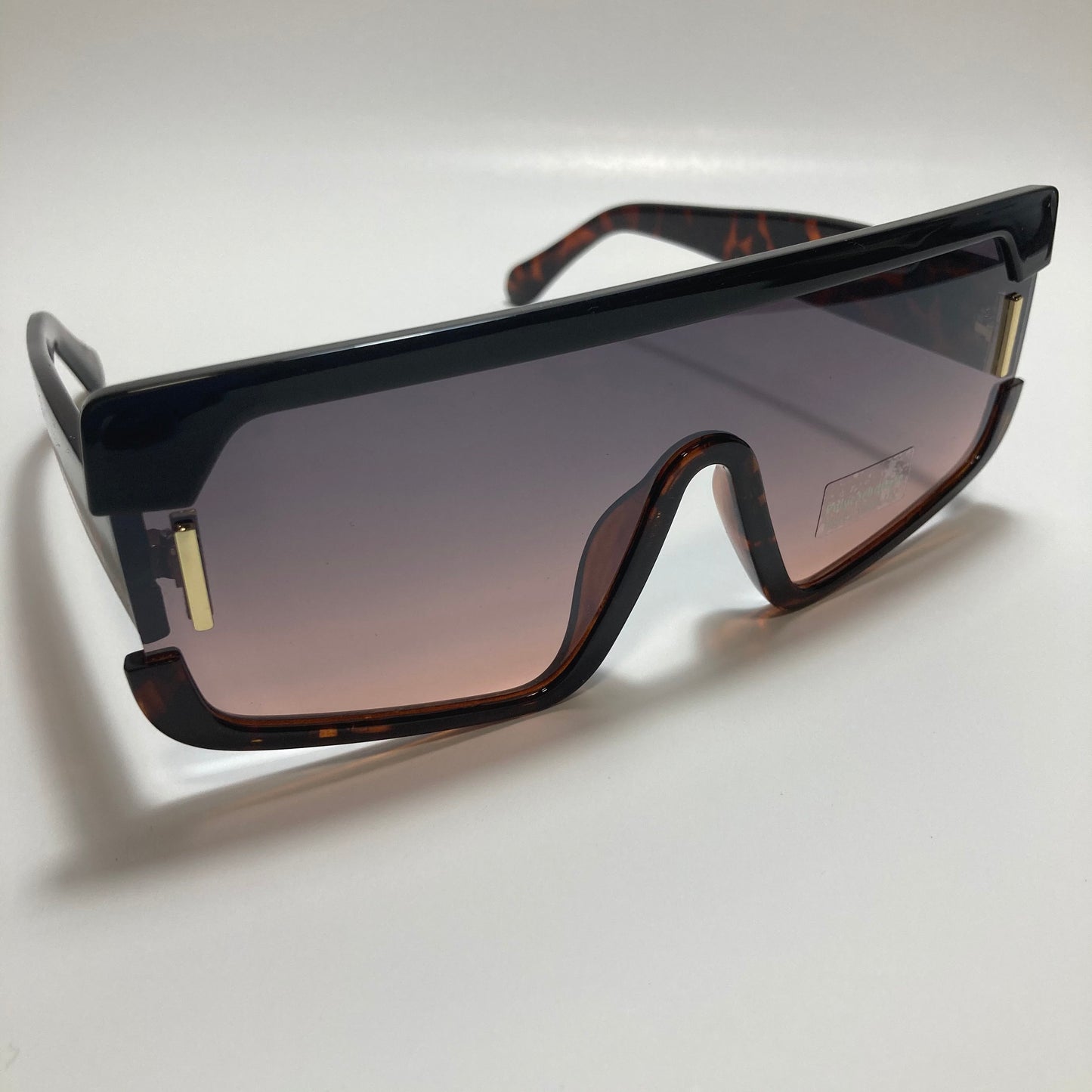 mens and womens brown and pink futuristic square sunglasses