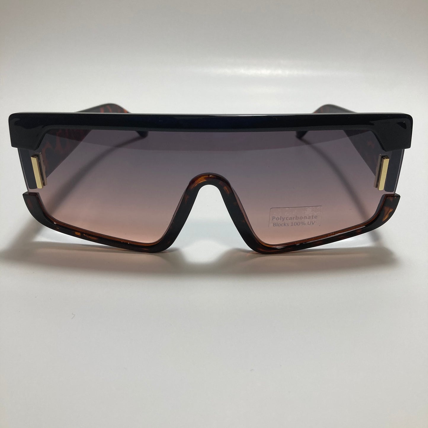 mens and womens brown and pink futuristic square sunglasses