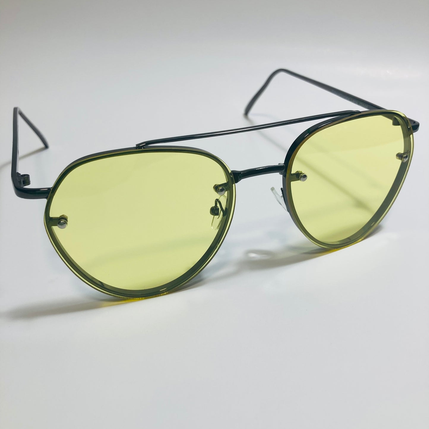 Womens and Mens Black Aviator sunglasses with yellow lenses