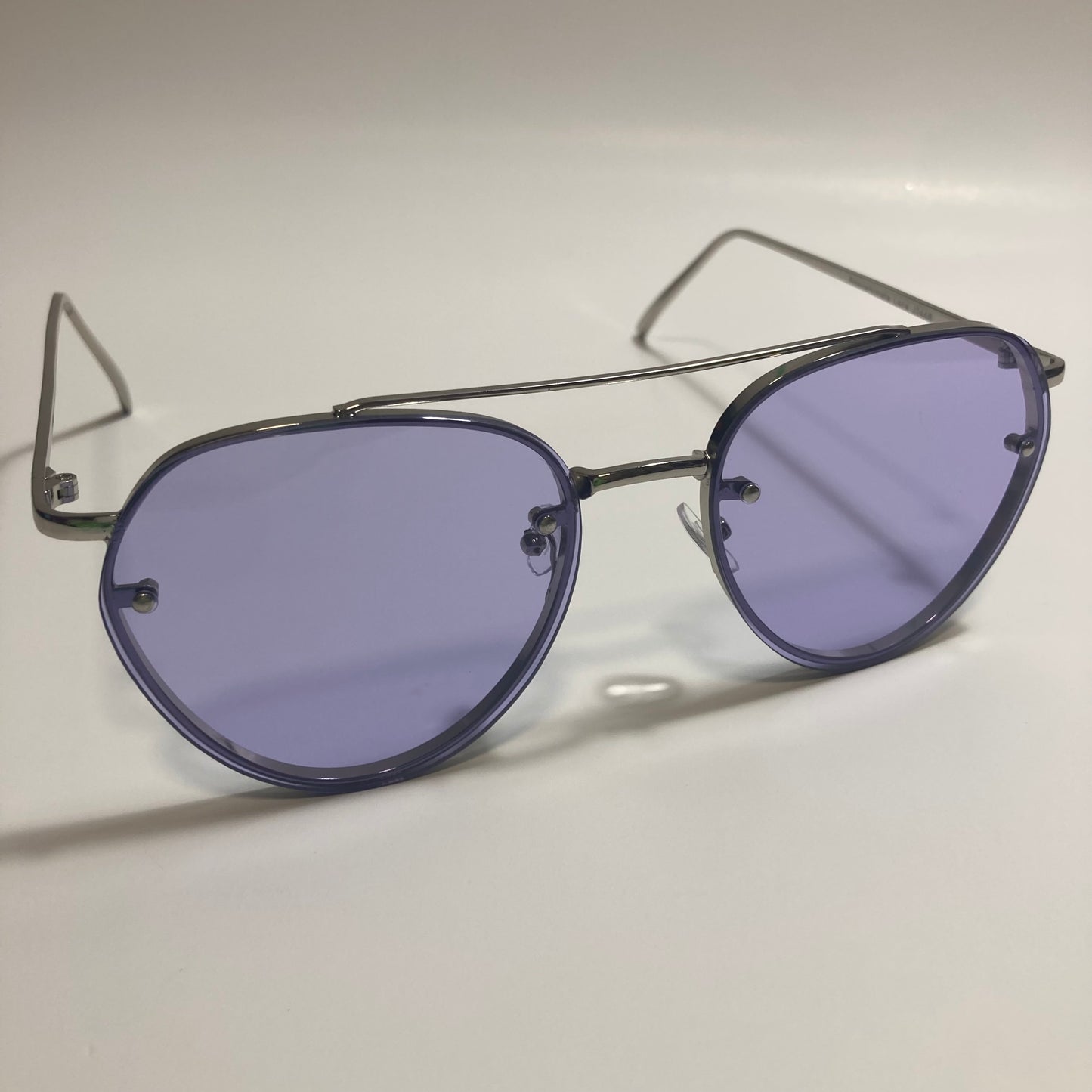 Womens and Mens silver Aviator sunglasses with purple lenses