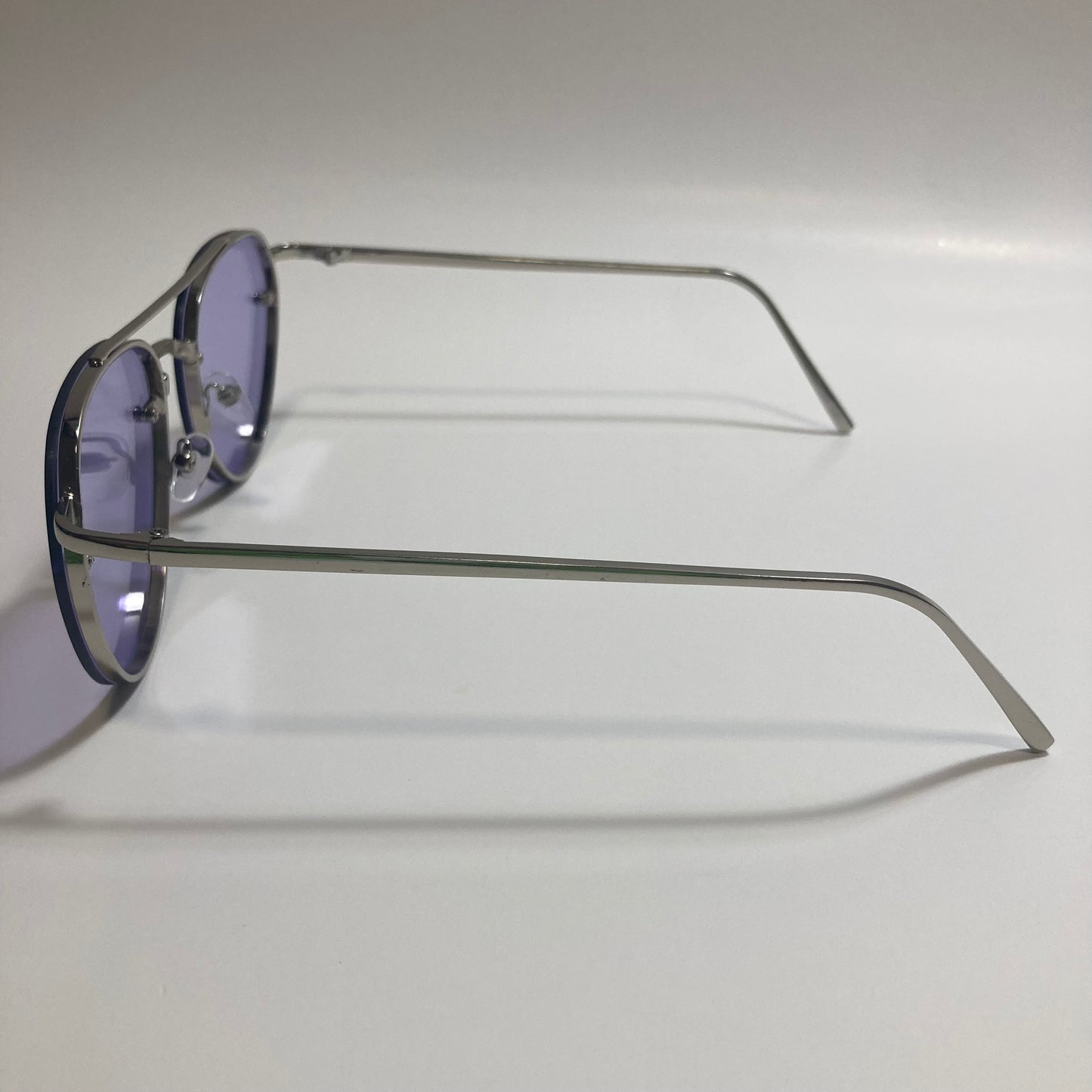 Womens and Mens silver Aviator sunglasses with purple lenses