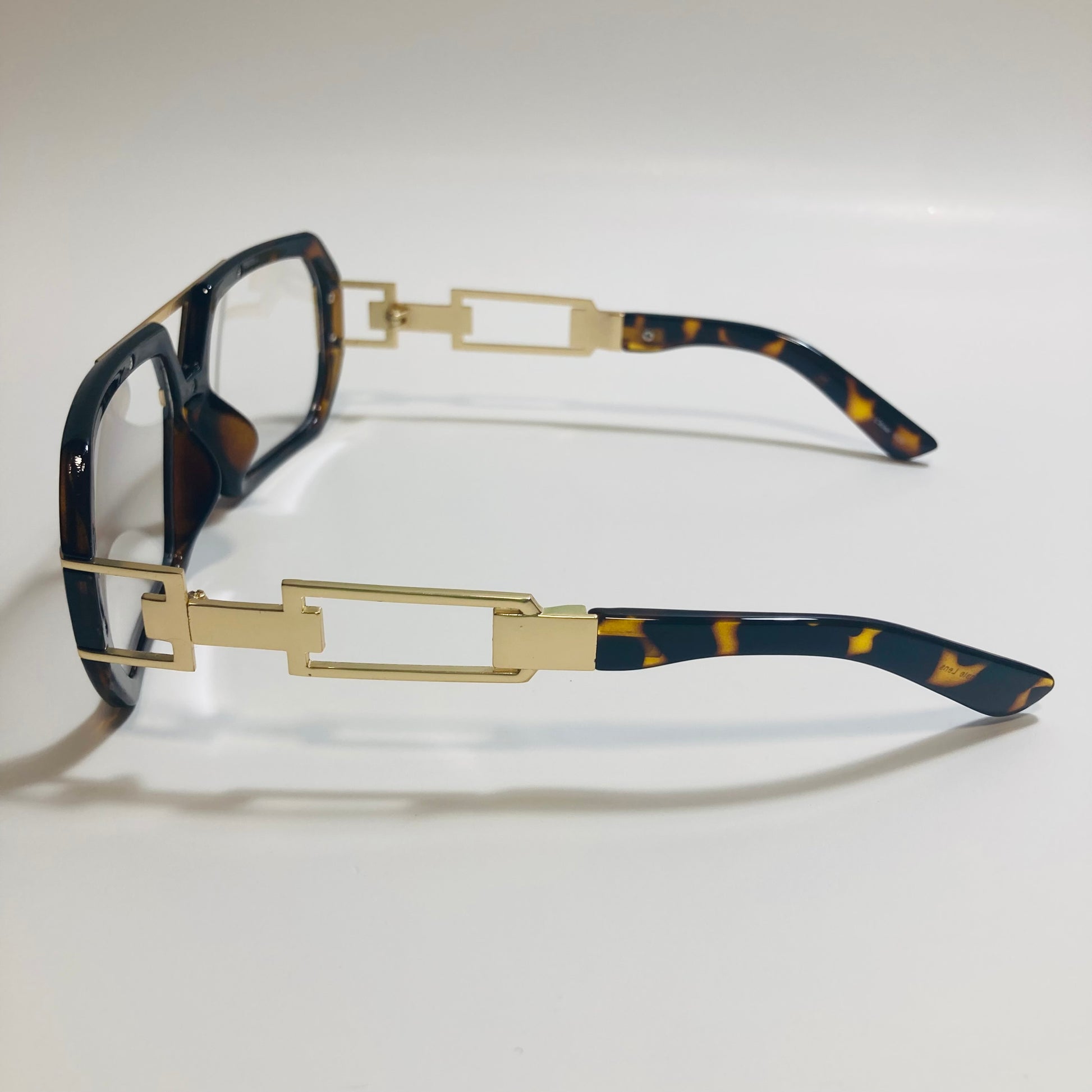 mens and womens brown and gold gazelle glasses