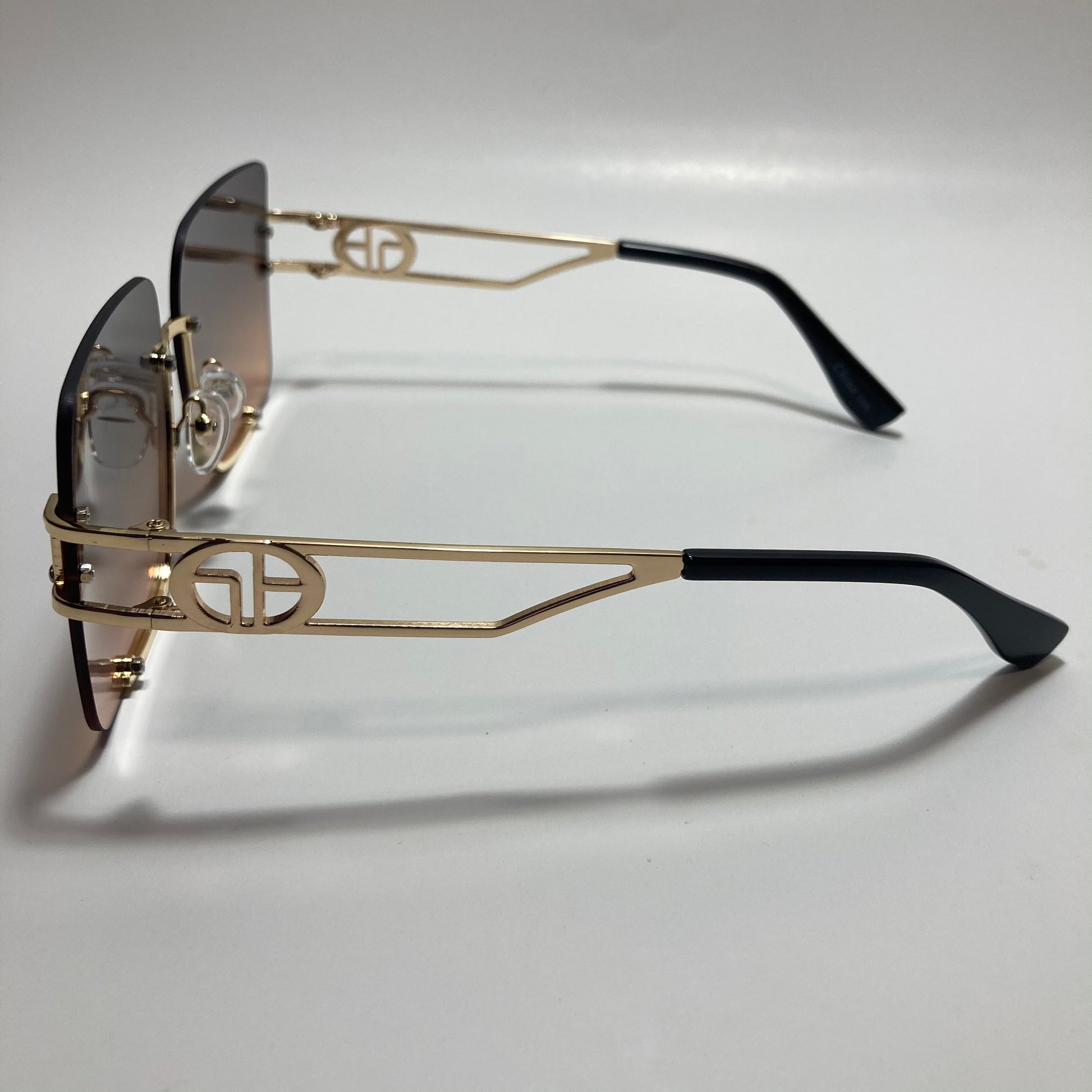 womens oversize square black and pink rimless sunglasses