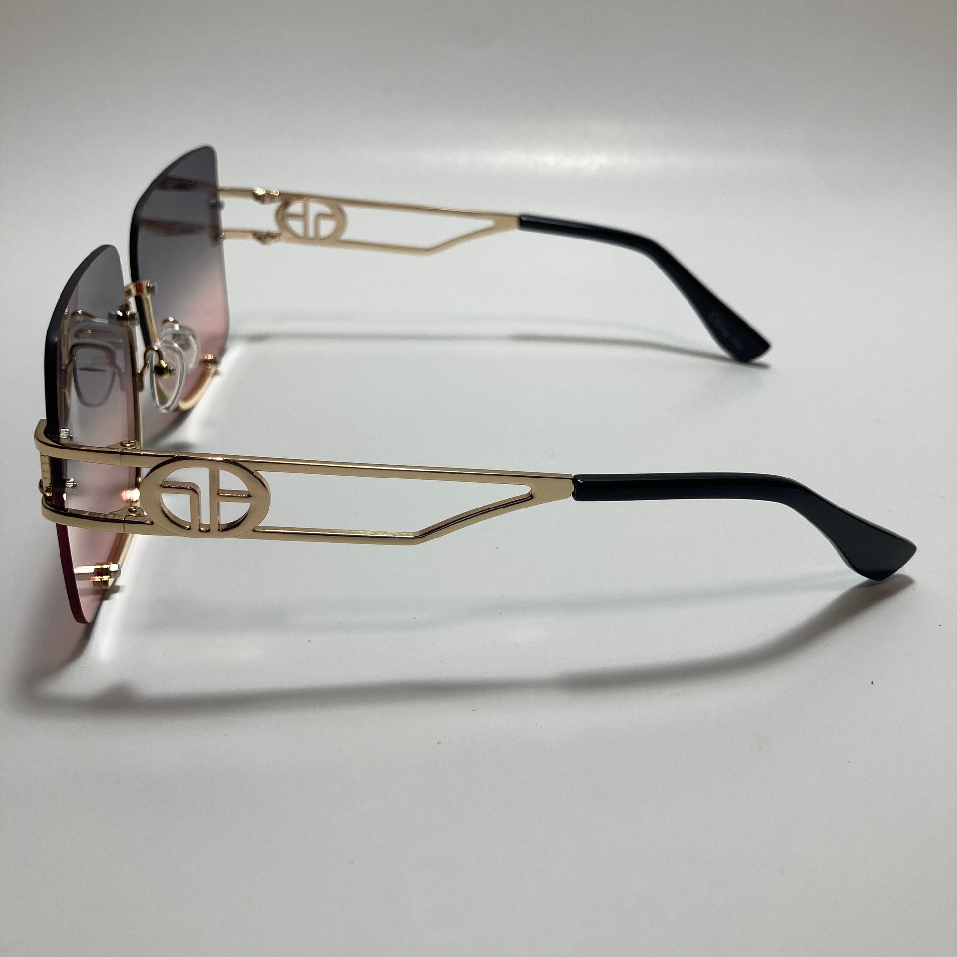 womens oversize square black and pink rimless sunglasses